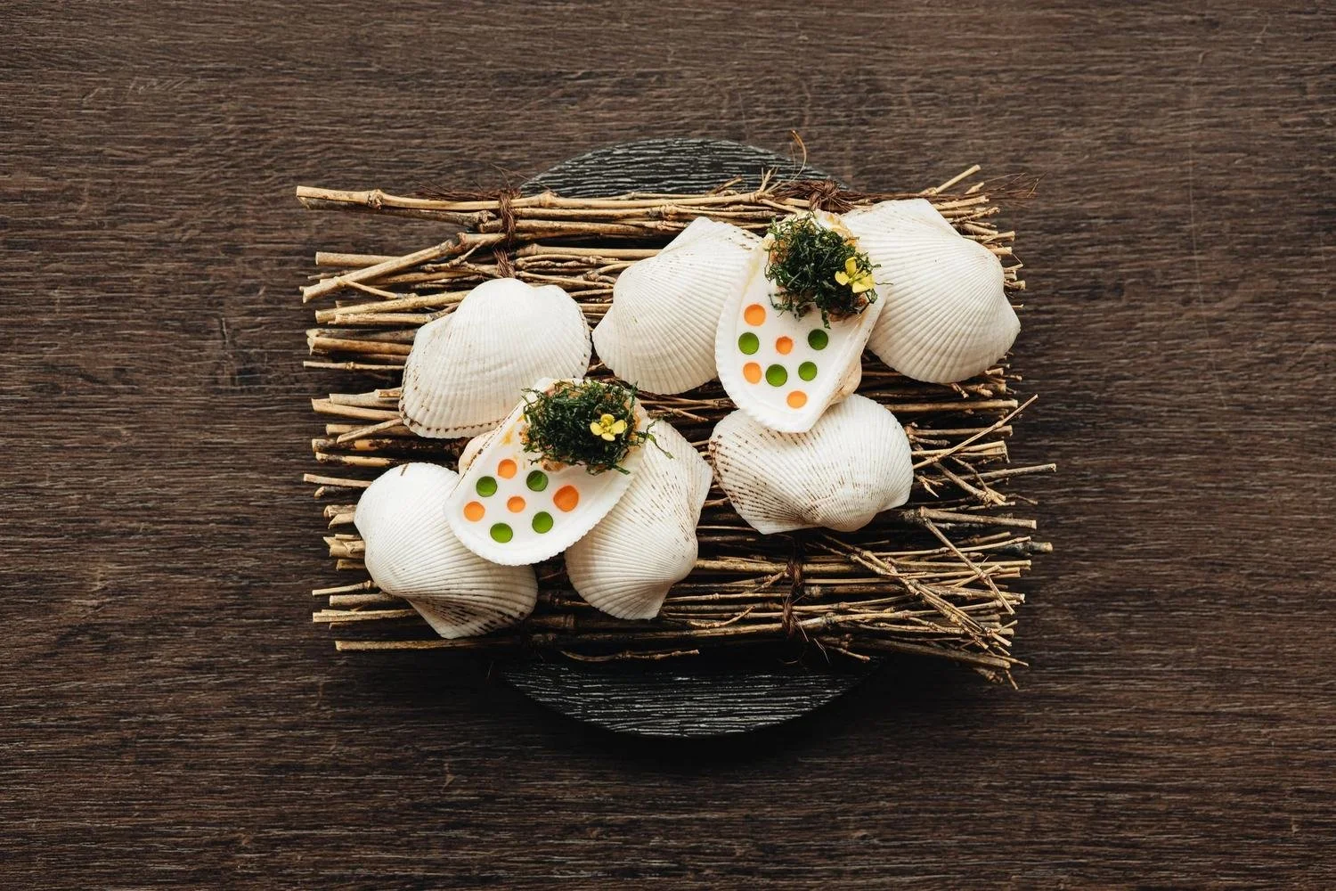 Shell canapés served on a nest of twigs at Royd