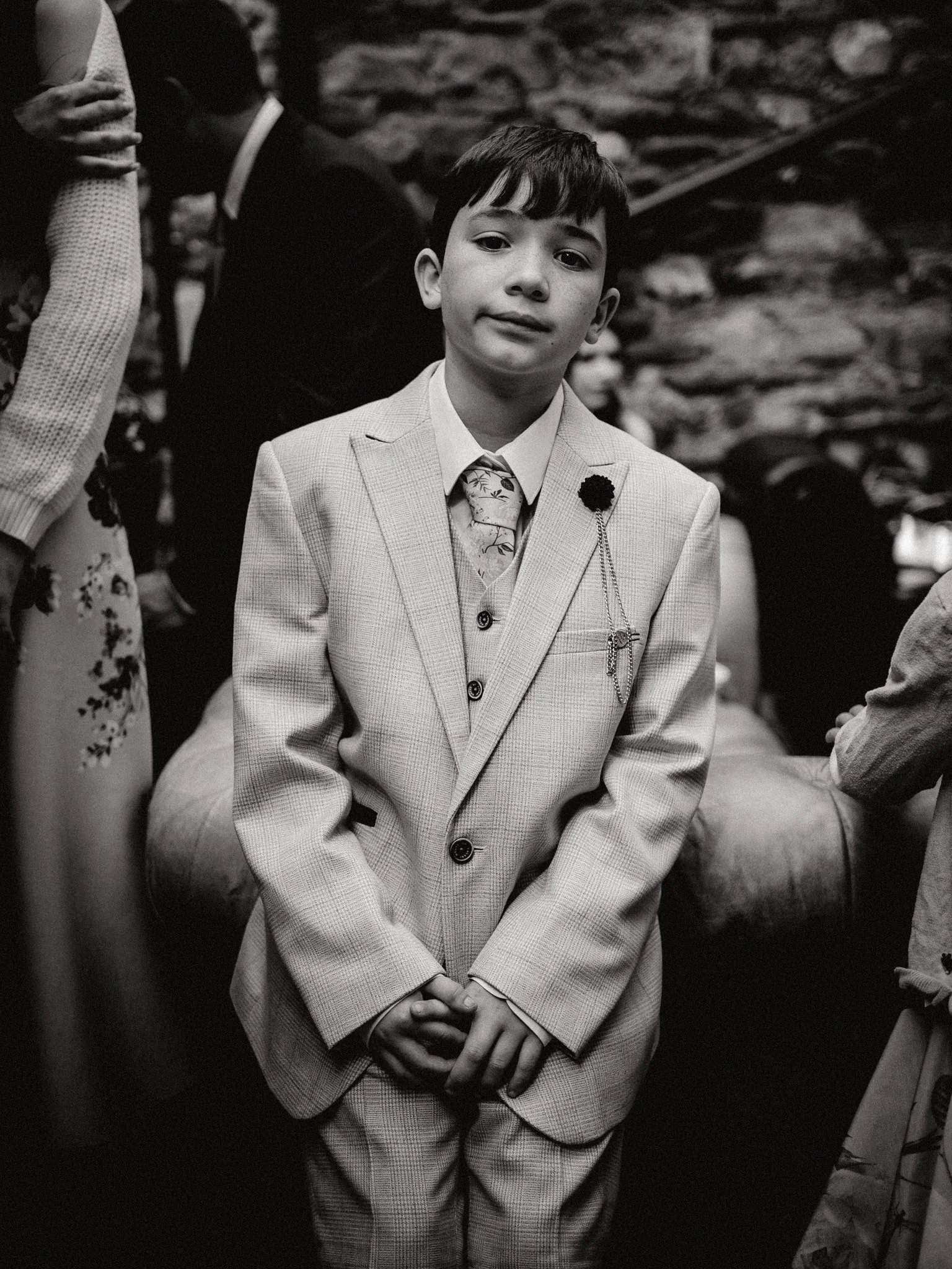 Young boy with soulful face at a wedding in Bristol