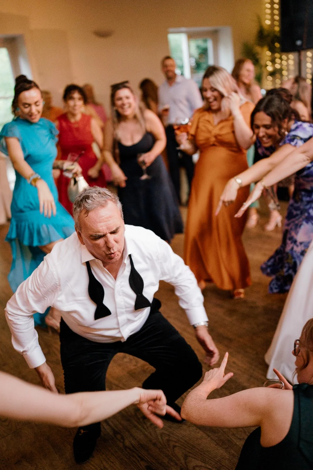 Father of the bride dancing at Matara wedding reception
