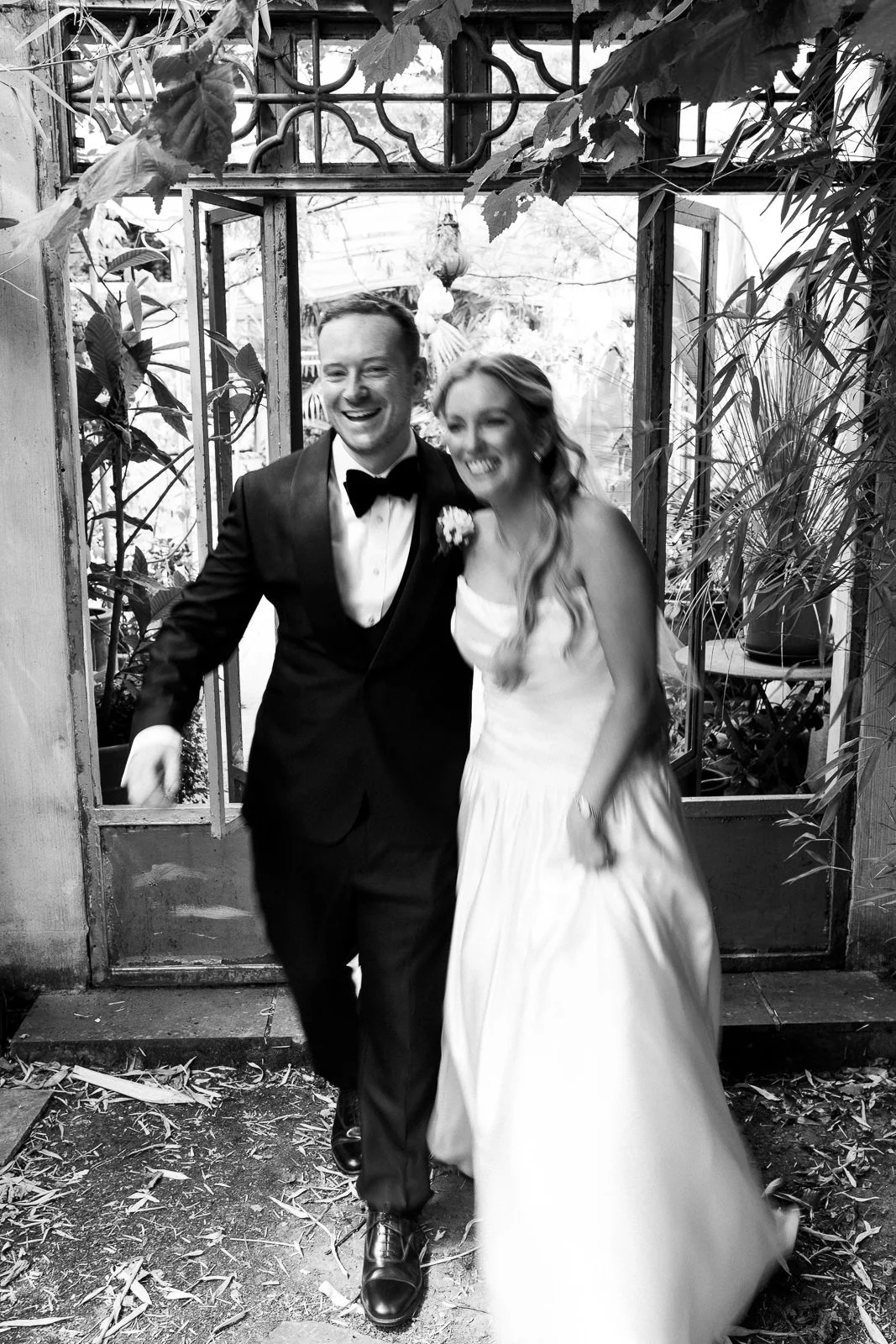 Bride and groom in doorway, motion blur portrait, Matara Cotswolds