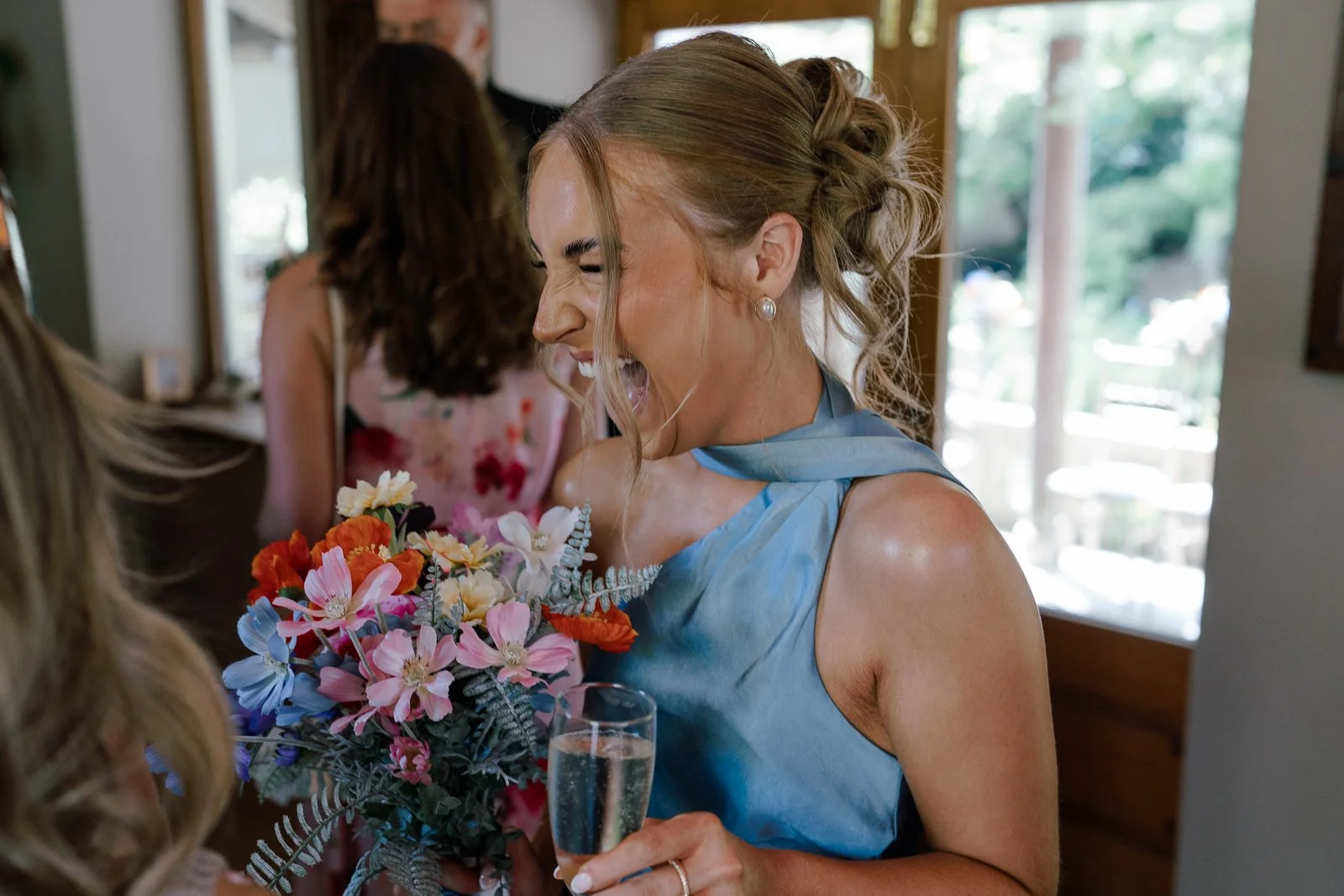 Wedding guest laughing during Matara wedding reception