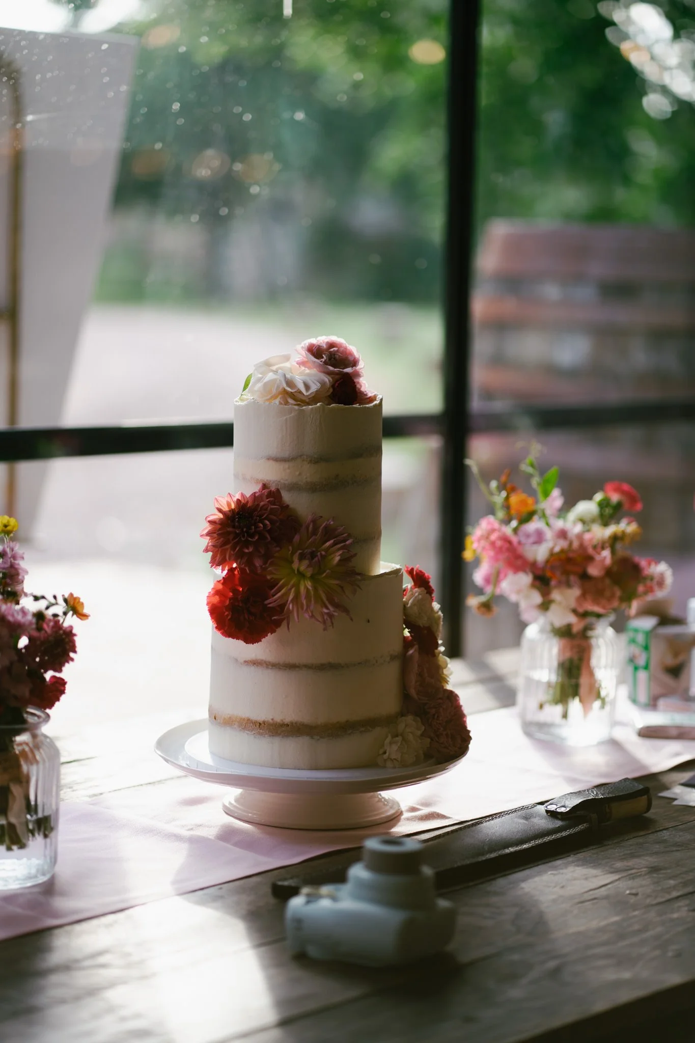 Wedding cake details by a window