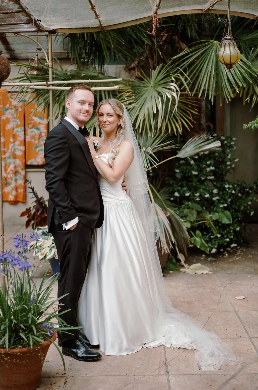 Couple portrait in the greenhouse at Matara wedding venue
