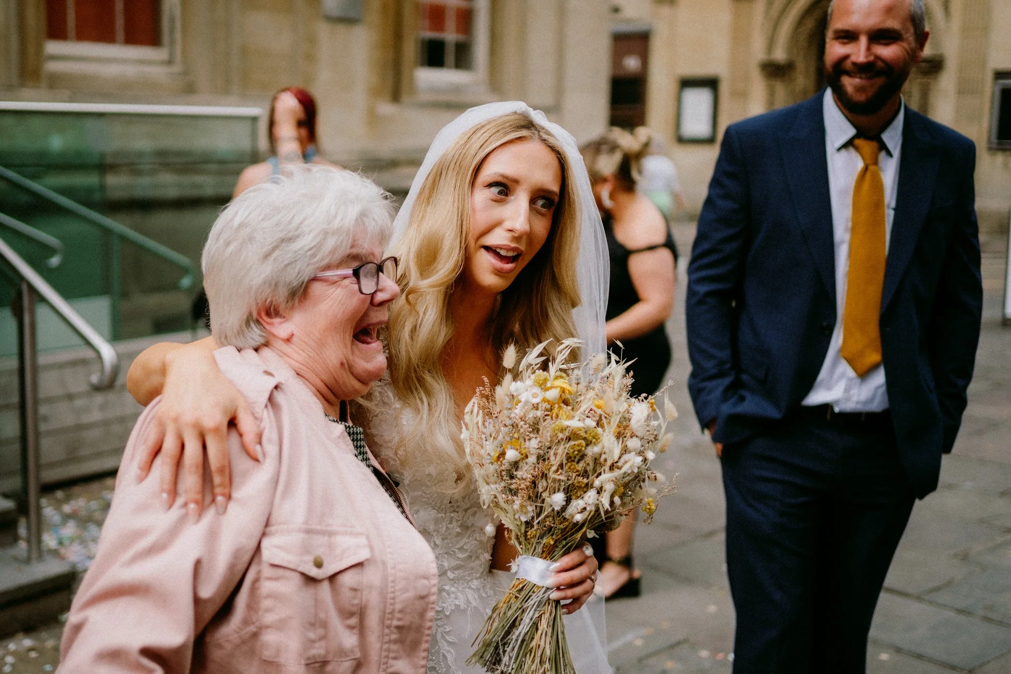 The Bride and a guest having fun at a Bristol Registry office wedding