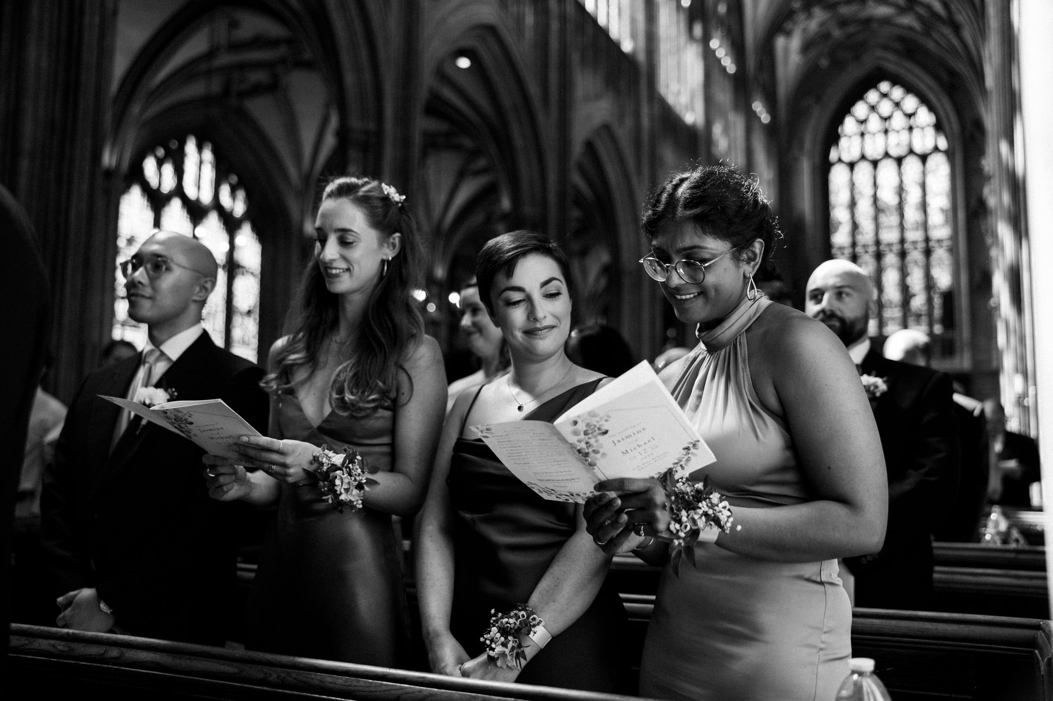 Bridesmaids singing in St Mary Redcliffe Cathedral at a wedding