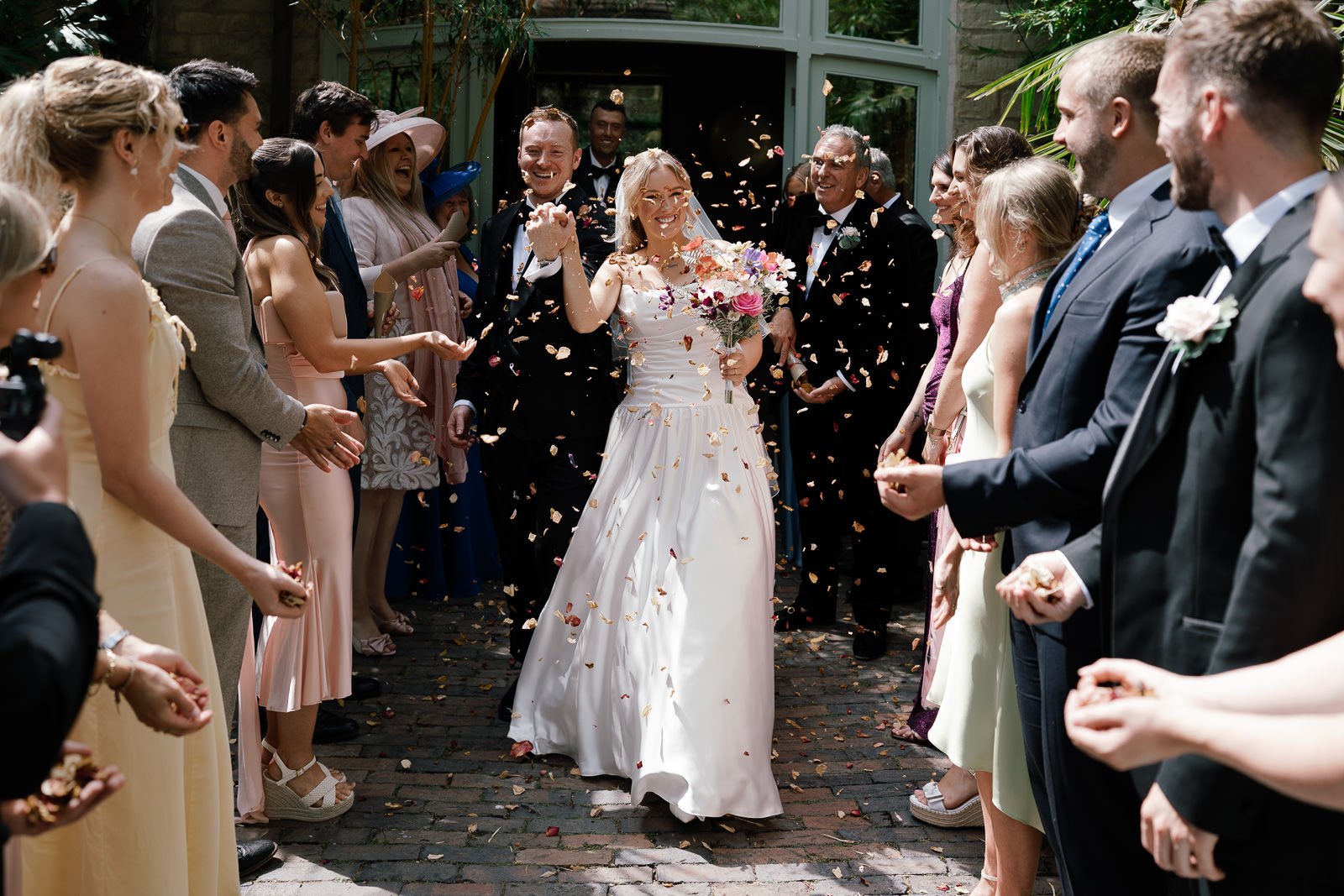 Confetti exit at Matara wedding, Cotswolds