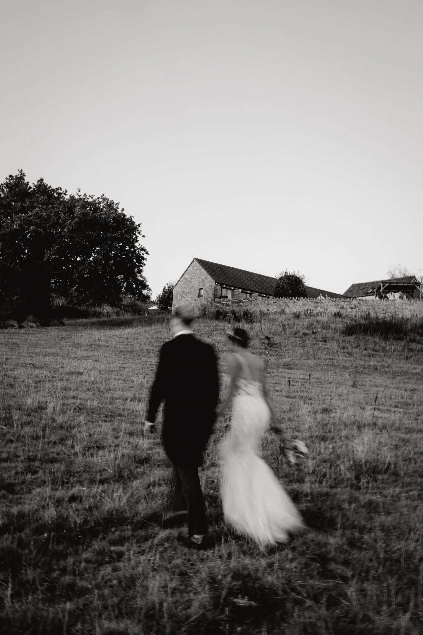 Slow shutter of bride and groom at Folly Farm in Bristol