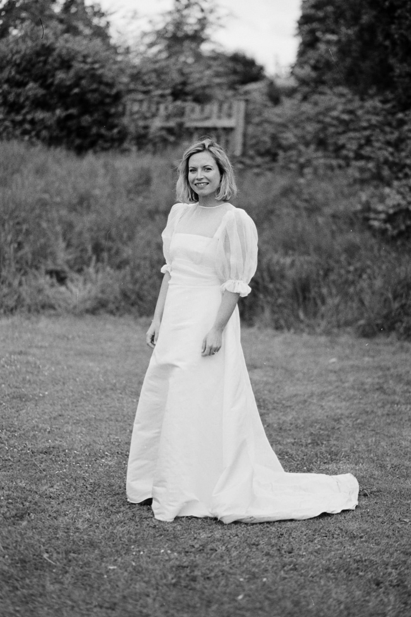 wedding photography of a bride wearing  Clover London gown