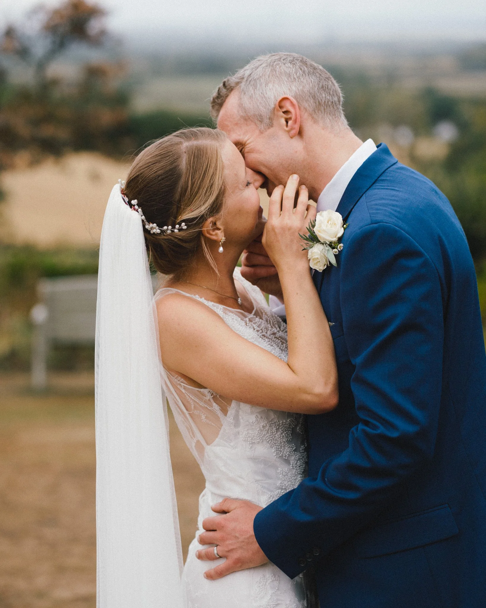 wedding photography of bride and groom kissing in Bristol
