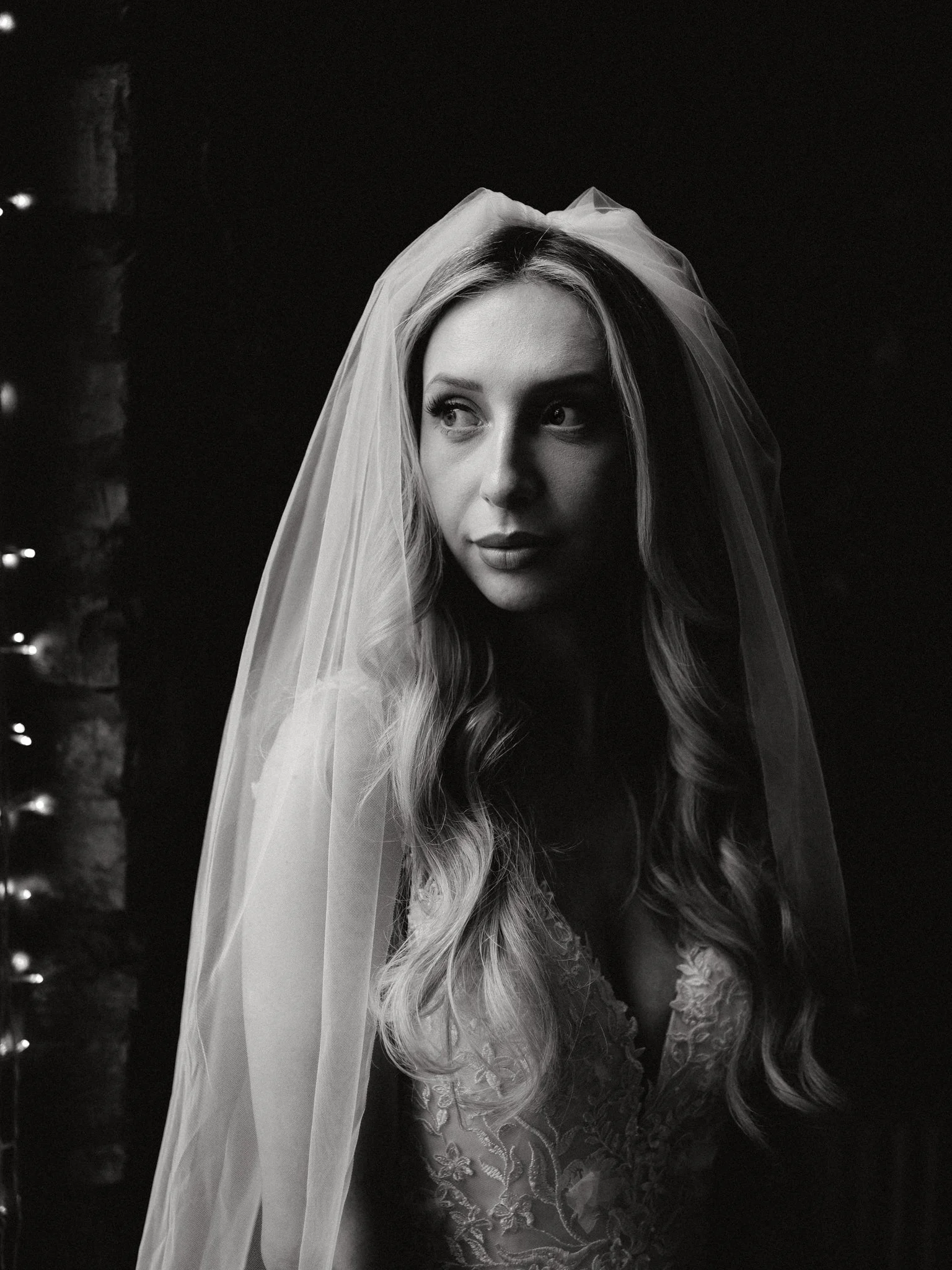 Bride by the window in black and white at the radnor Rooms Bristol