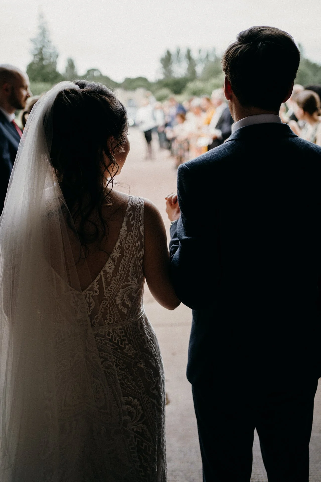 Hereford Cathedral wedding bride and groom before confetti