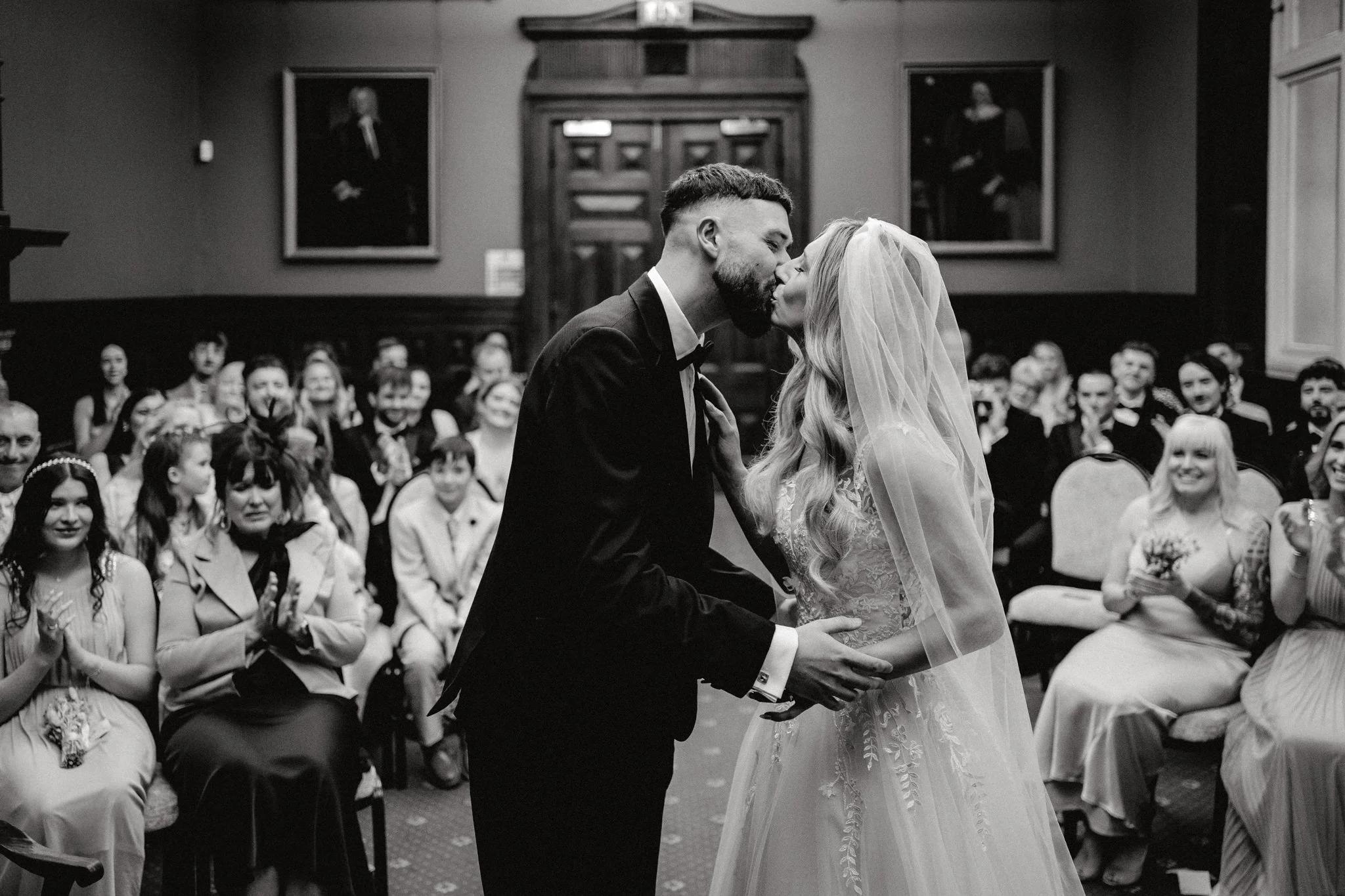 The first kiss at a wedding in the Mayoral Room at Bristol Register Office