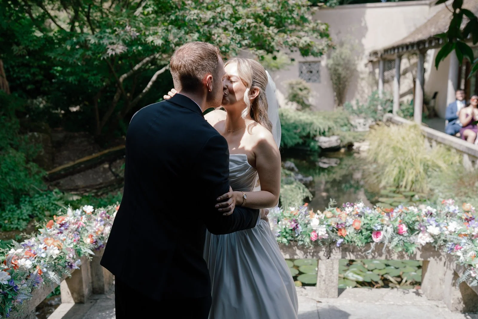 Bride and groom's first kiss at Matara garden wedding ceremony