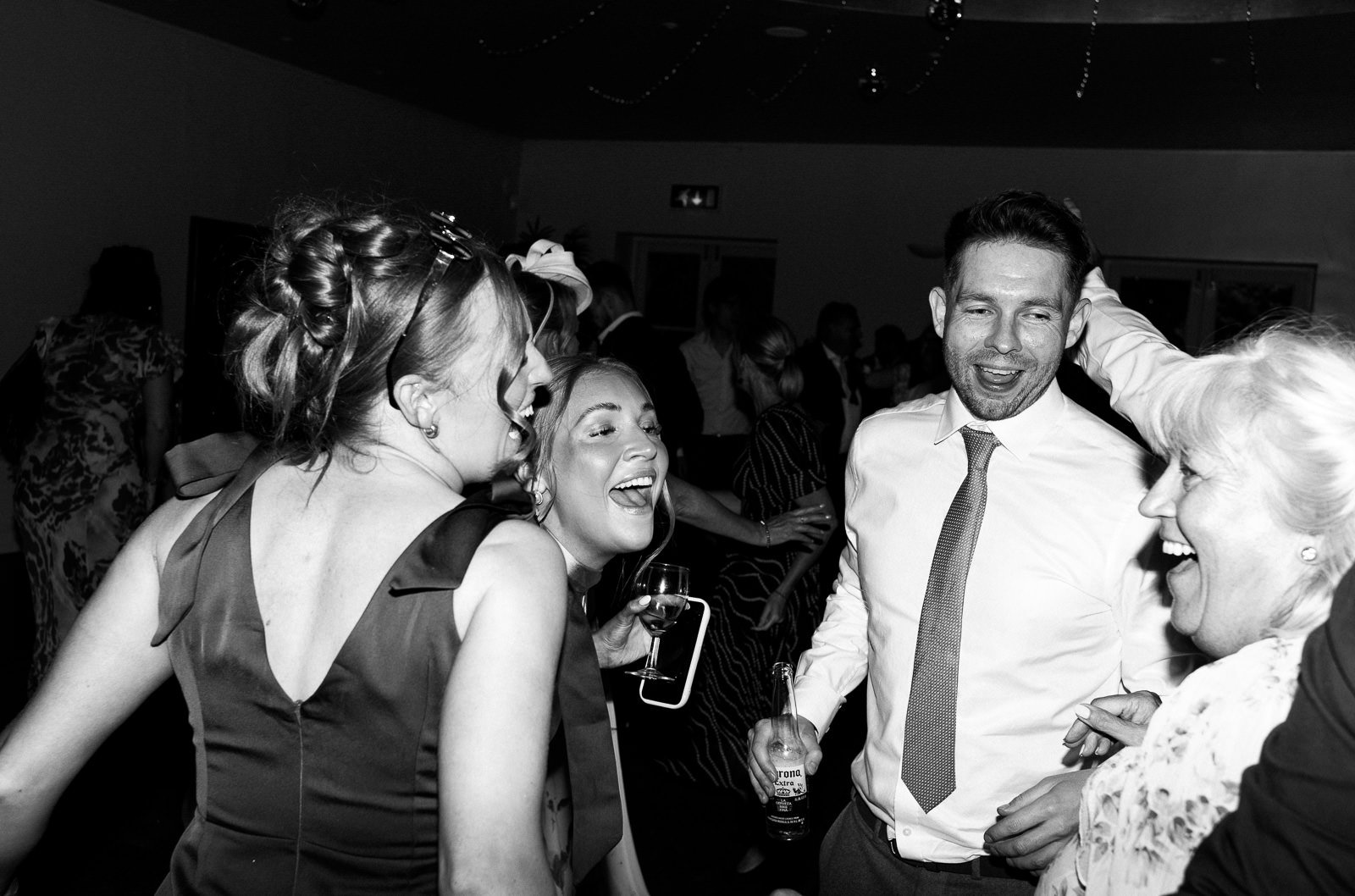 Wedding dancefloor chaos with flash photography, Matara Cotswolds