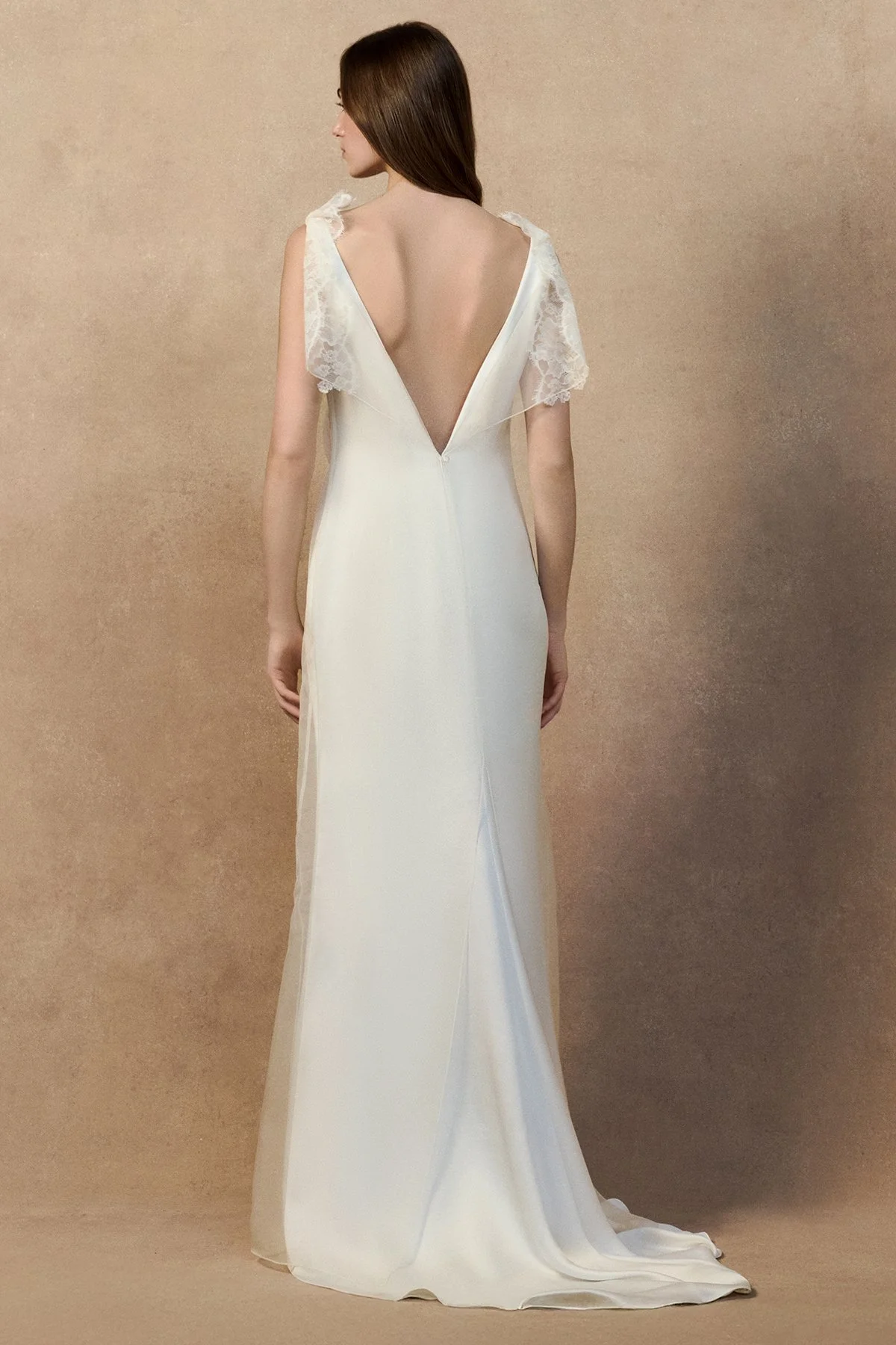 back image of monty dress with a sheer organza overlay and high neckline, an open back and a crepe-back satin underdress with a soft fit-and-flare silhouette.