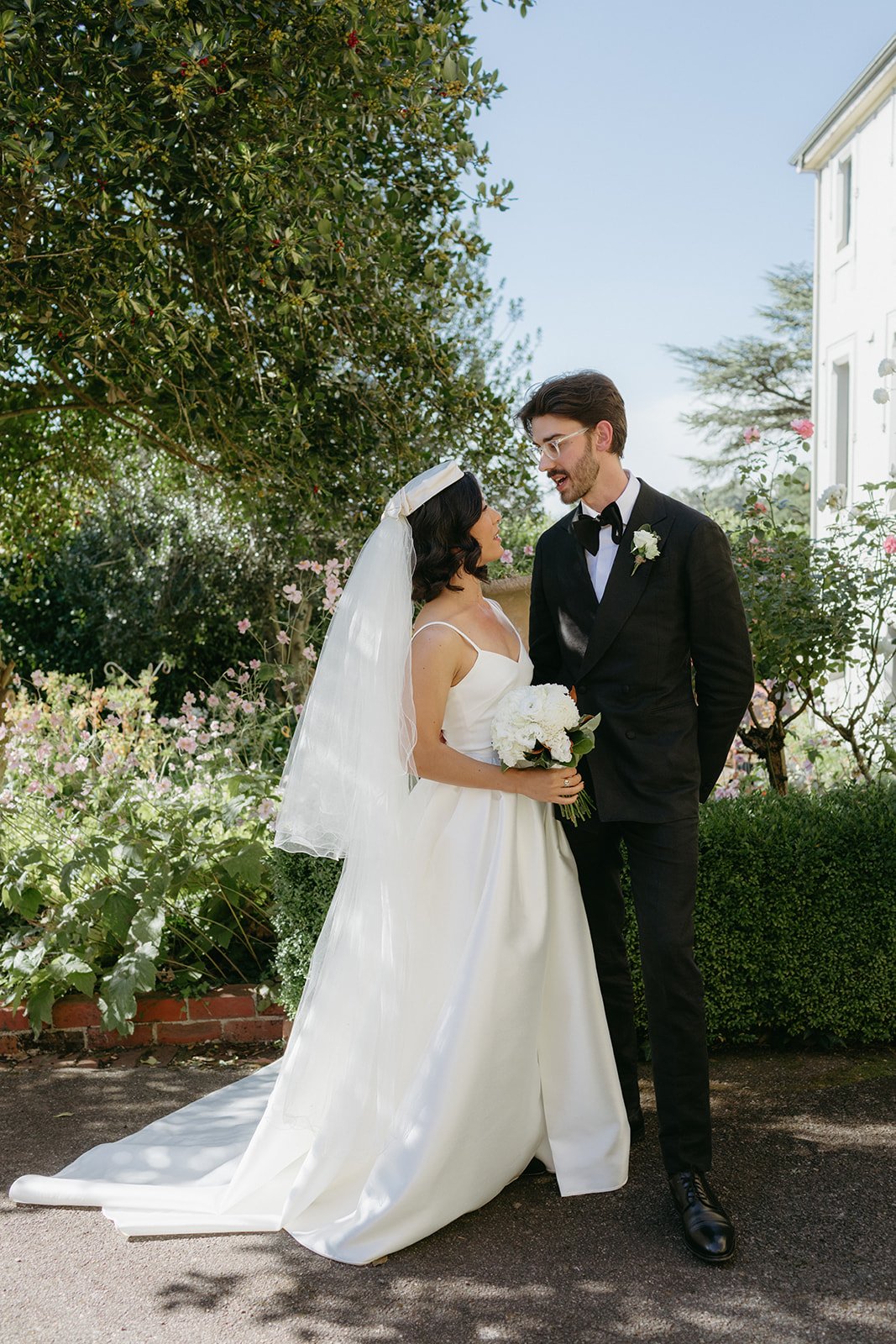Beautiful bride Jill wore the Victor wedding dress and Christian overskirt by Halfpenny London