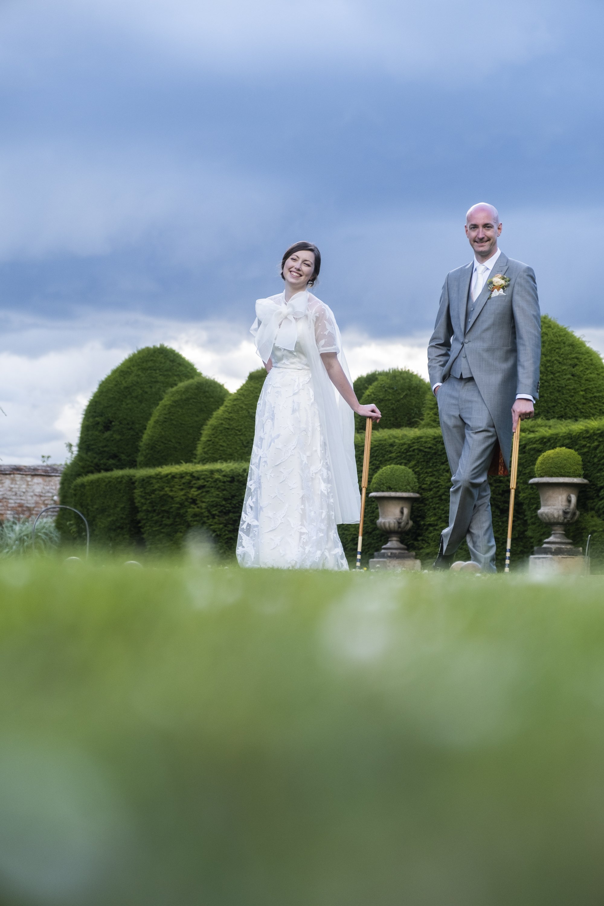 Beautiful bride Harriet wore the Bluebell wedding dress and Long Organza Bow Jacket by Halfpenny London