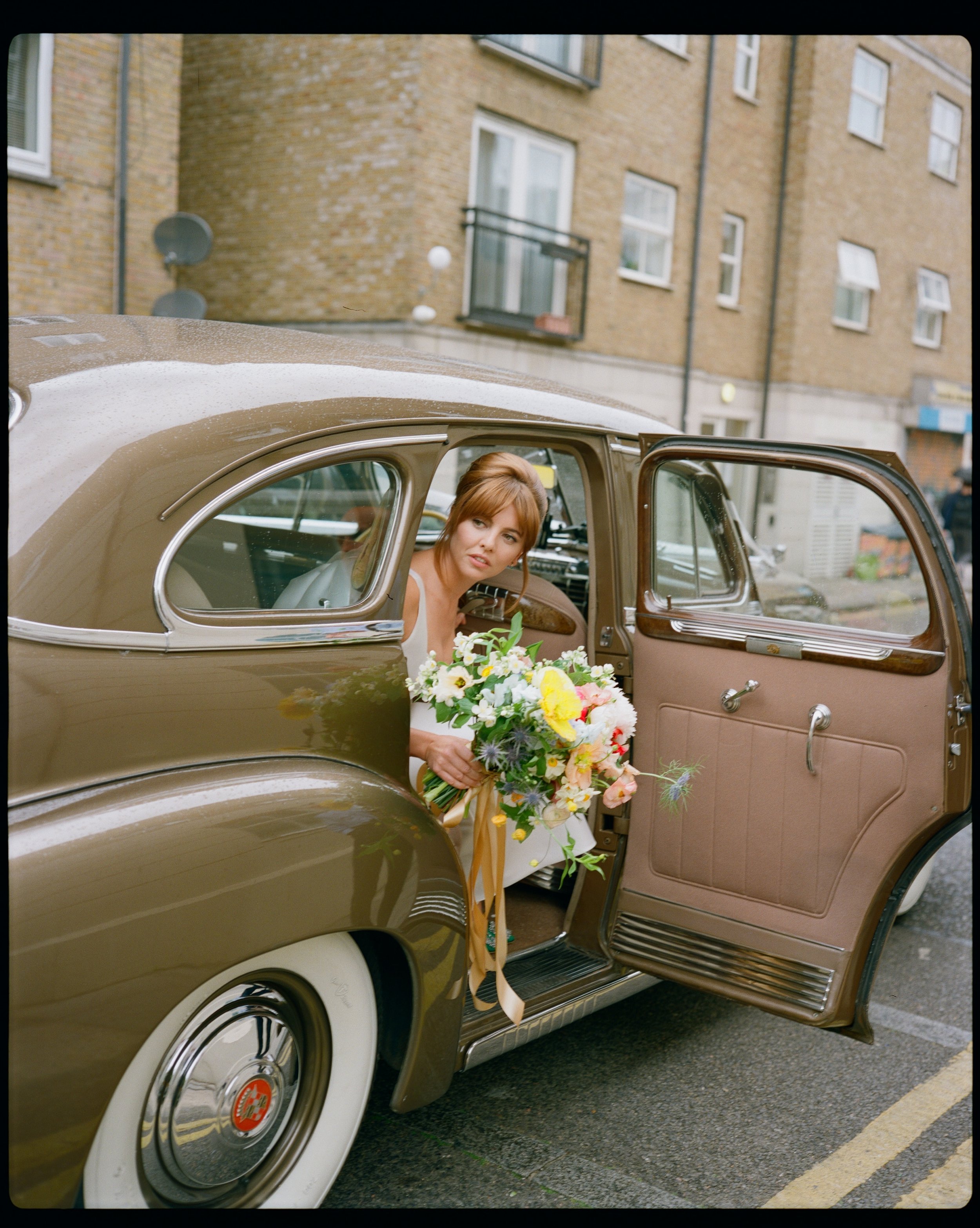 Stunning Ophelia Lovibond ties the knot in bespoke Halfpenny London