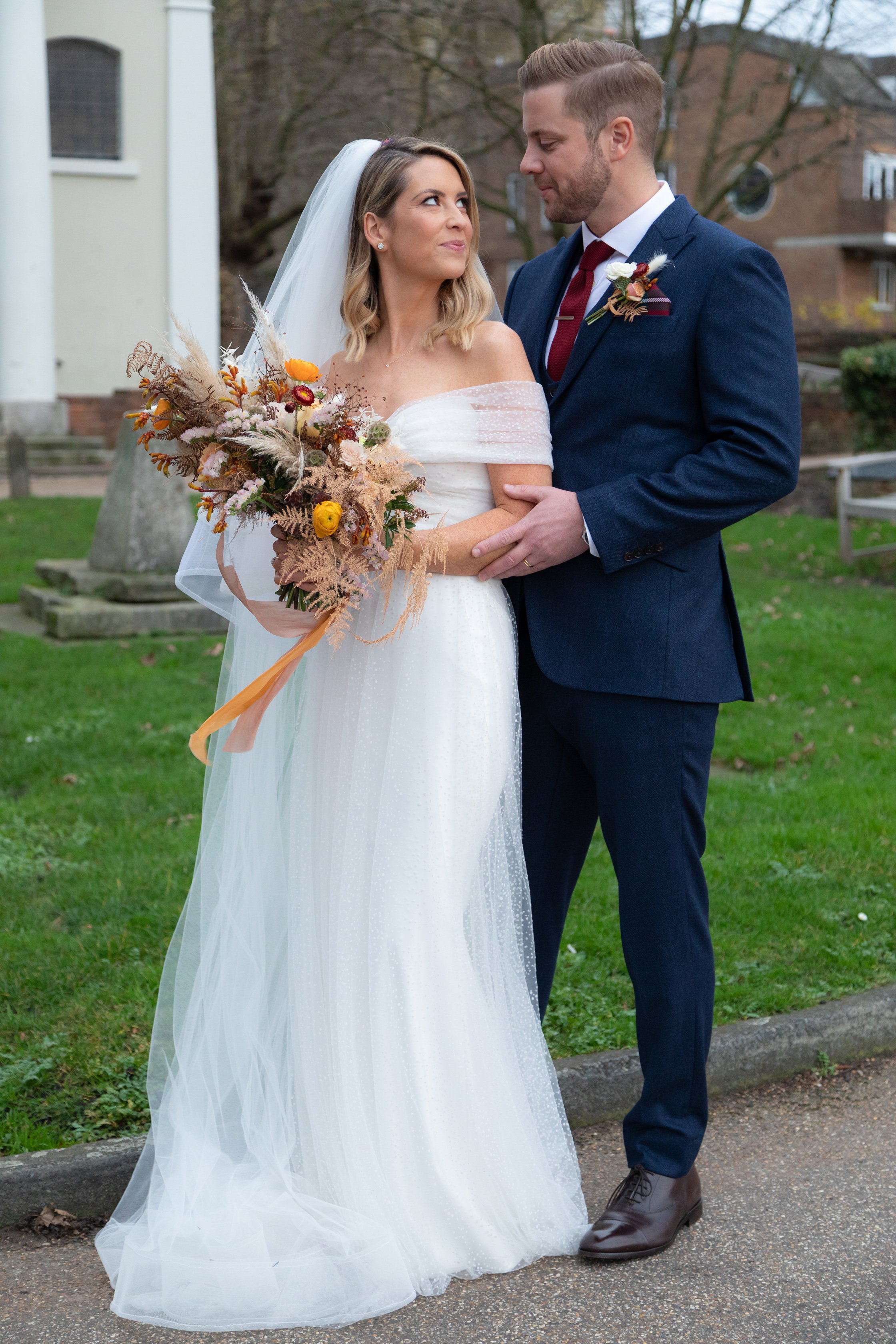 Beautiful bride Kate wore a wedding dress by Halfpenny London