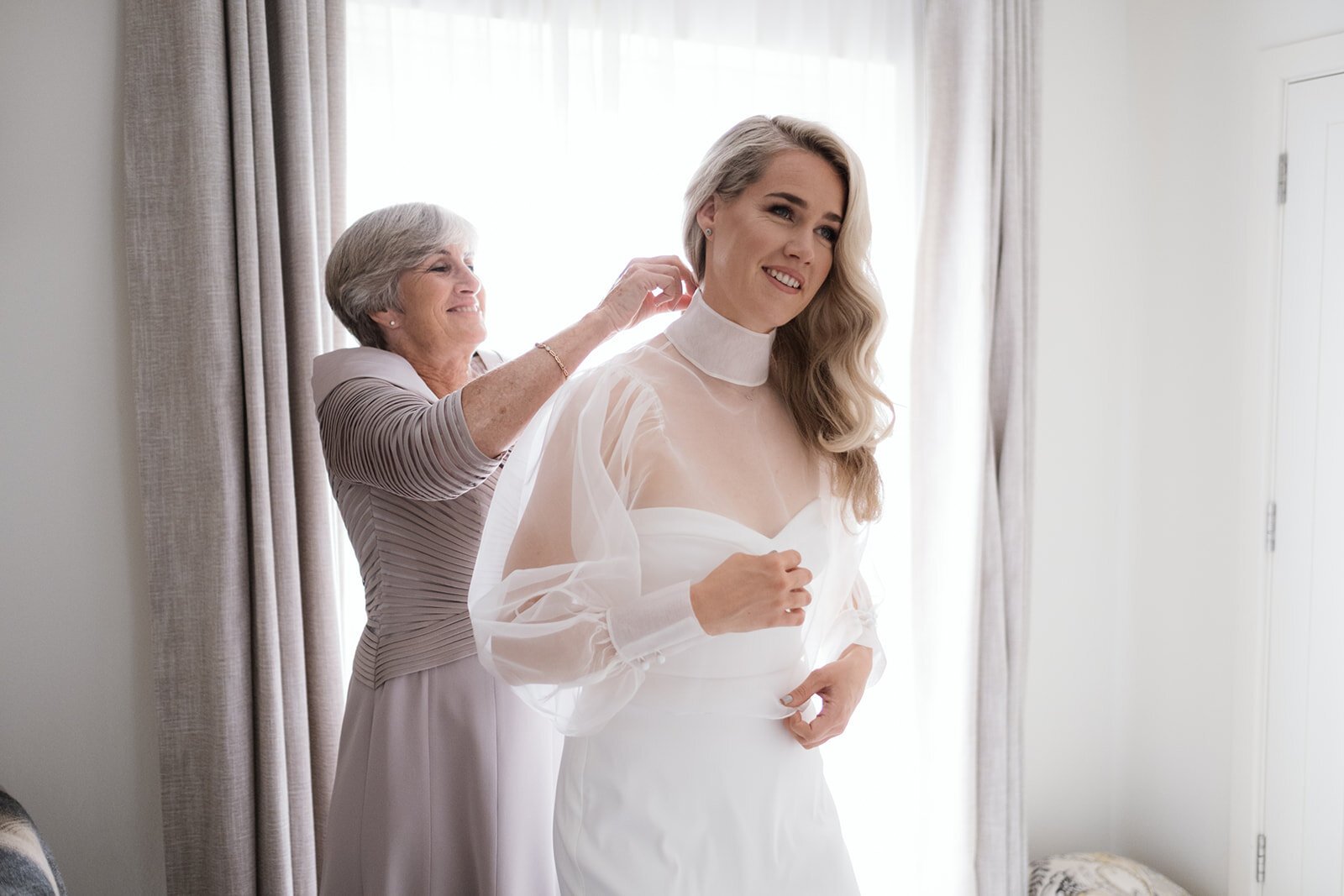 Beautiful bride Emma wore a wedding dress and silk organza top by Halfpenny London