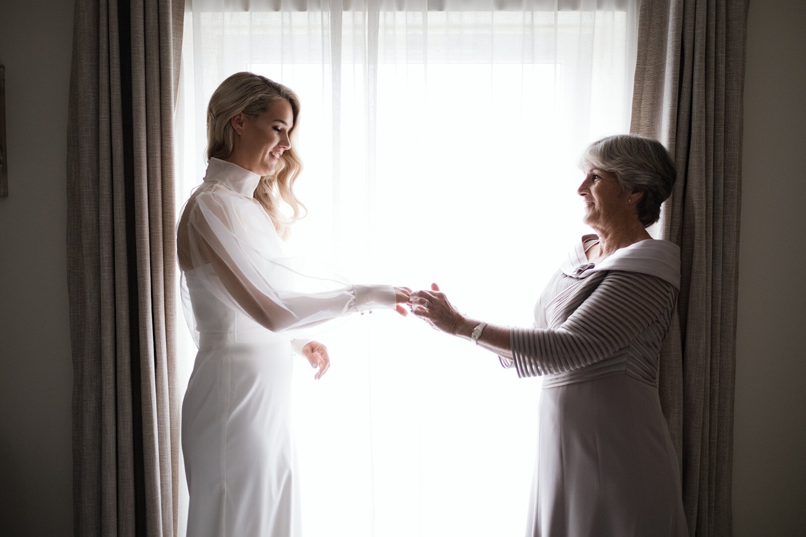 Beautiful bride Emma wore a wedding dress and silk organza top by Halfpenny London