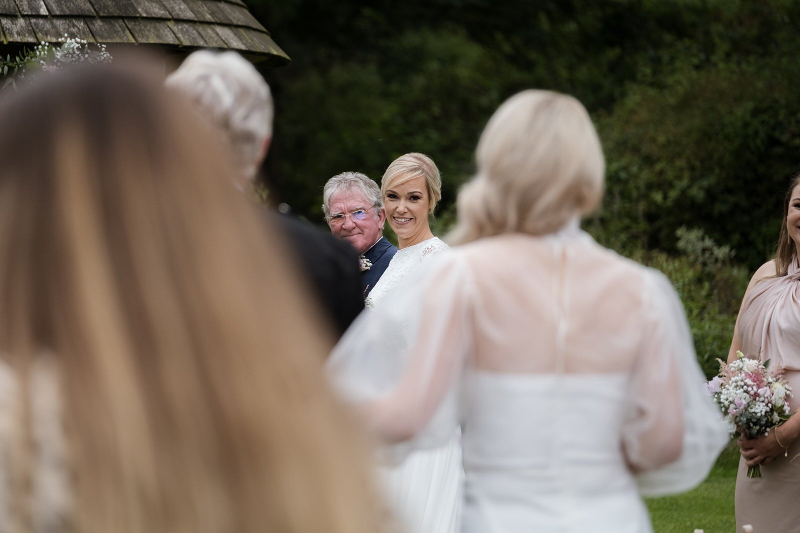 Beautiful bride Emma wore a wedding dress and silk organza top by Halfpenny London