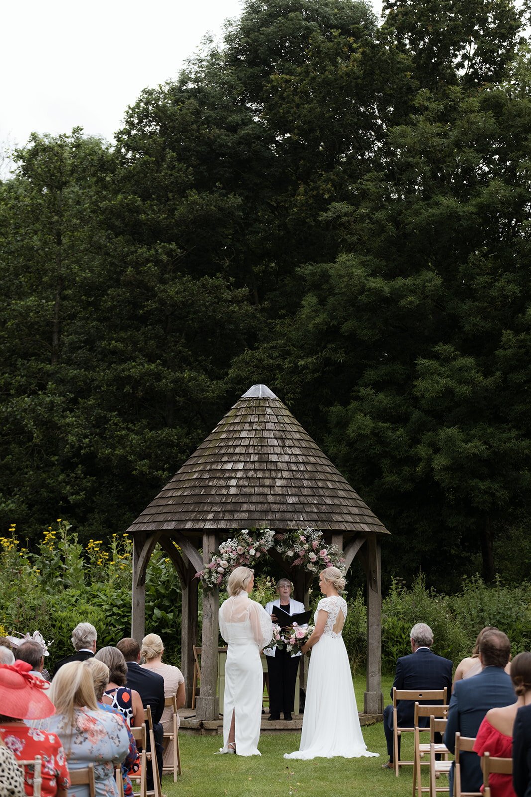 Beautiful bride Emma wore a wedding dress and silk organza top by Halfpenny London