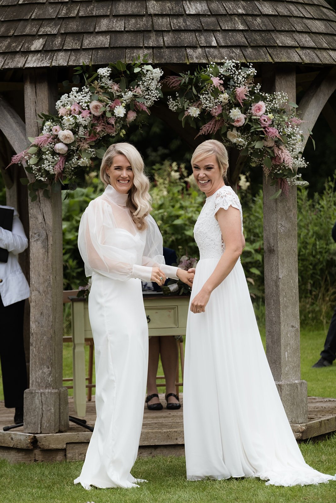 Beautiful bride Emma wore a wedding dress and silk organza top by Halfpenny London