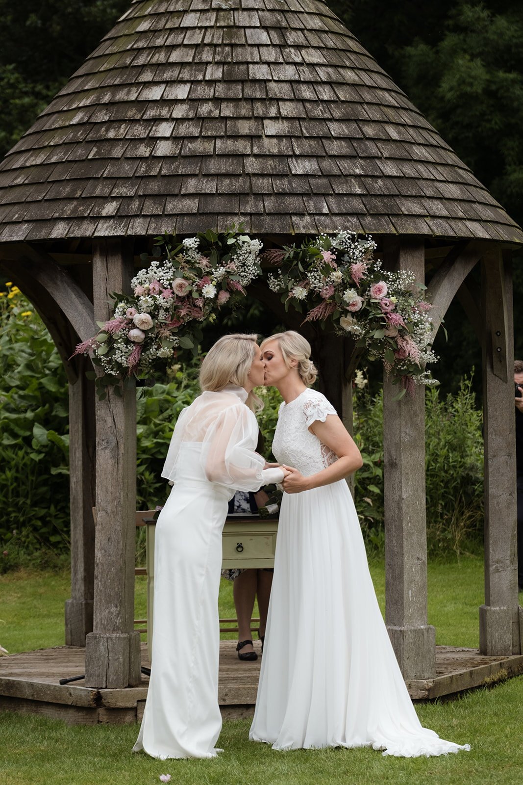 Beautiful bride Emma wore a wedding dress and silk organza top by Halfpenny London