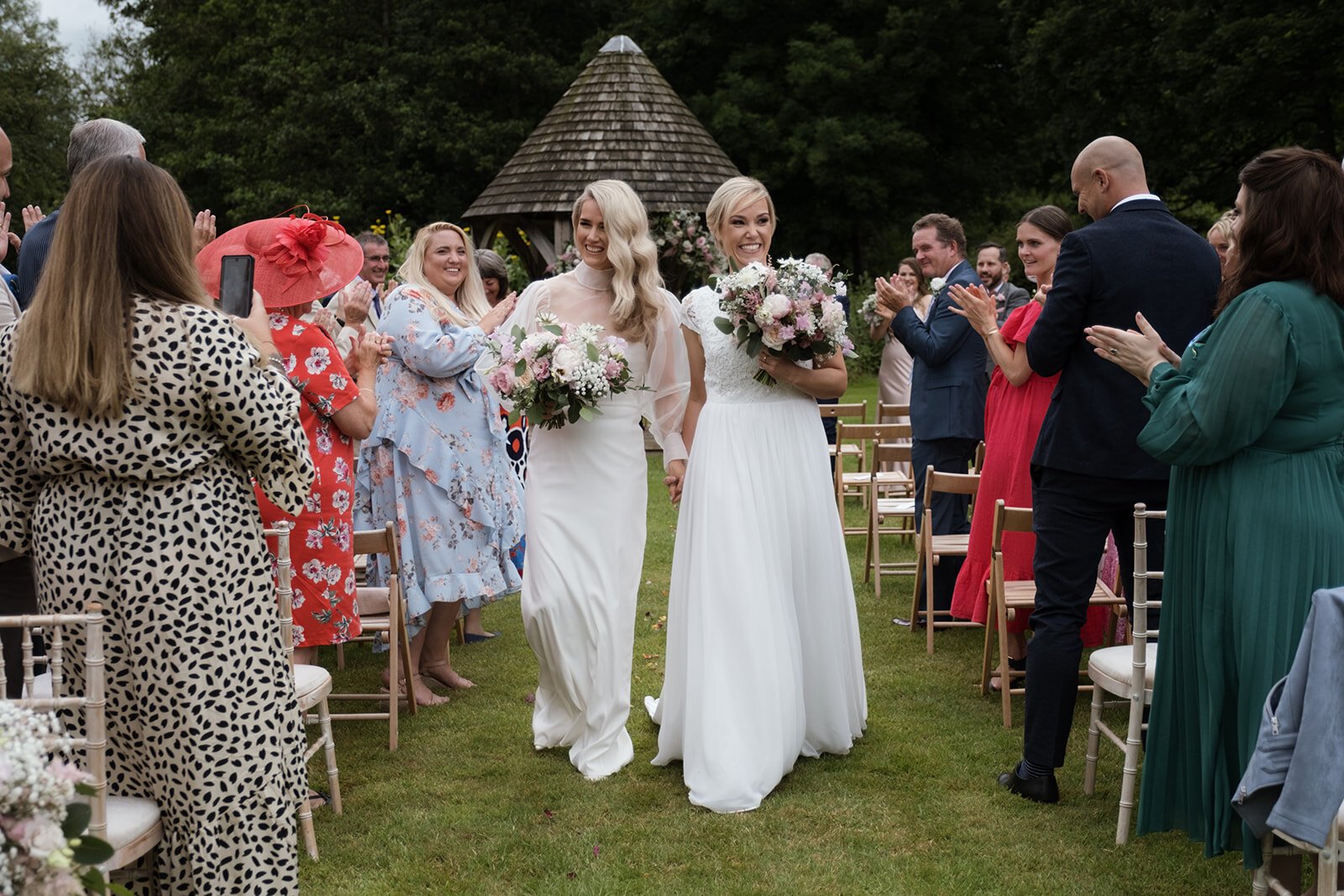 Beautiful bride Emma wore a wedding dress and silk organza top by Halfpenny London