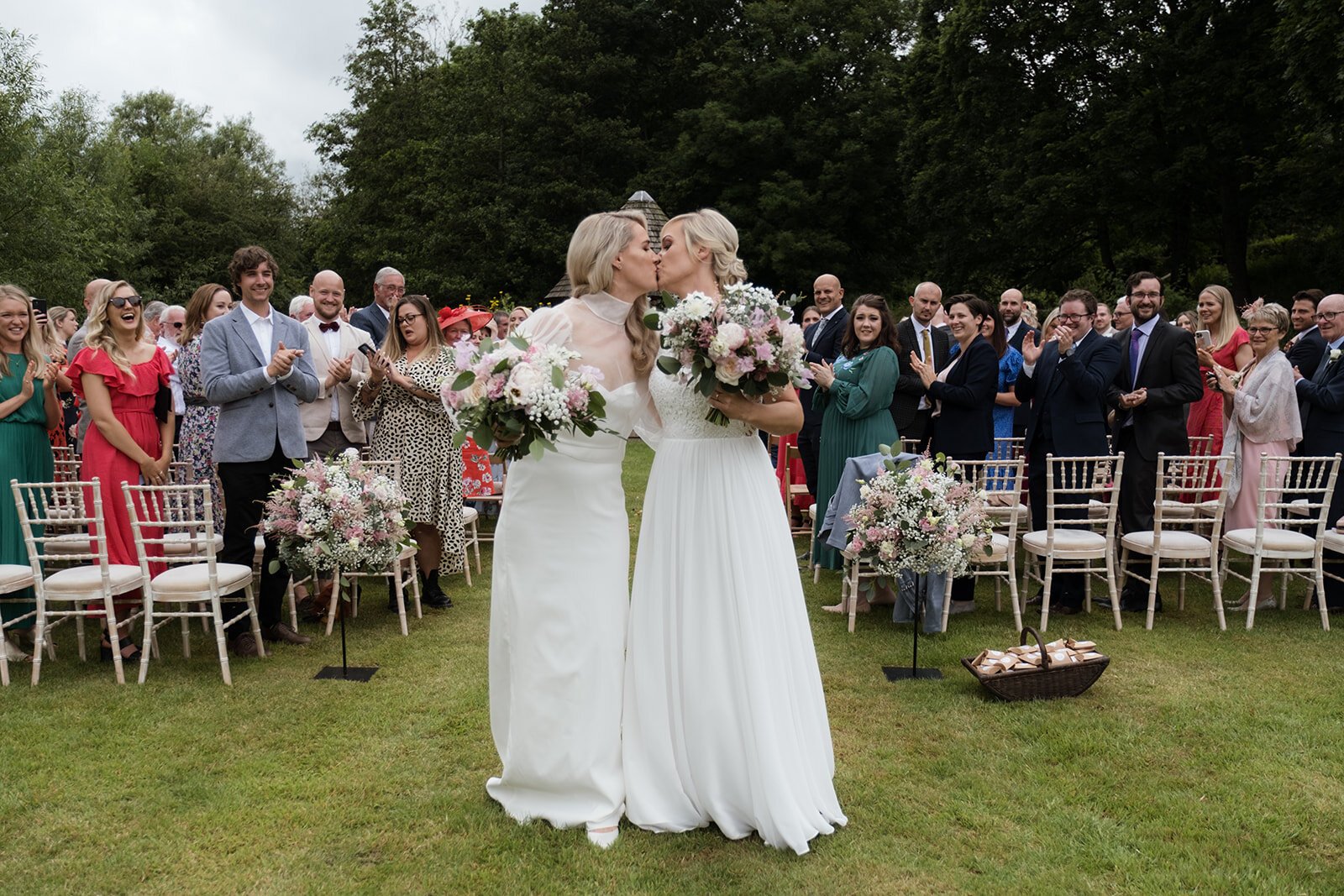 Beautiful bride Emma wore a wedding dress and silk organza top by Halfpenny London