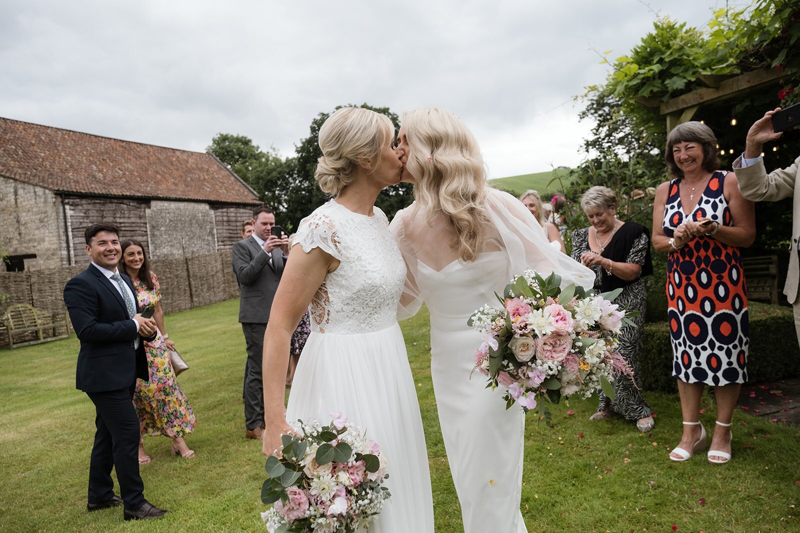 Beautiful bride Emma wore a wedding dress and silk organza top by Halfpenny London