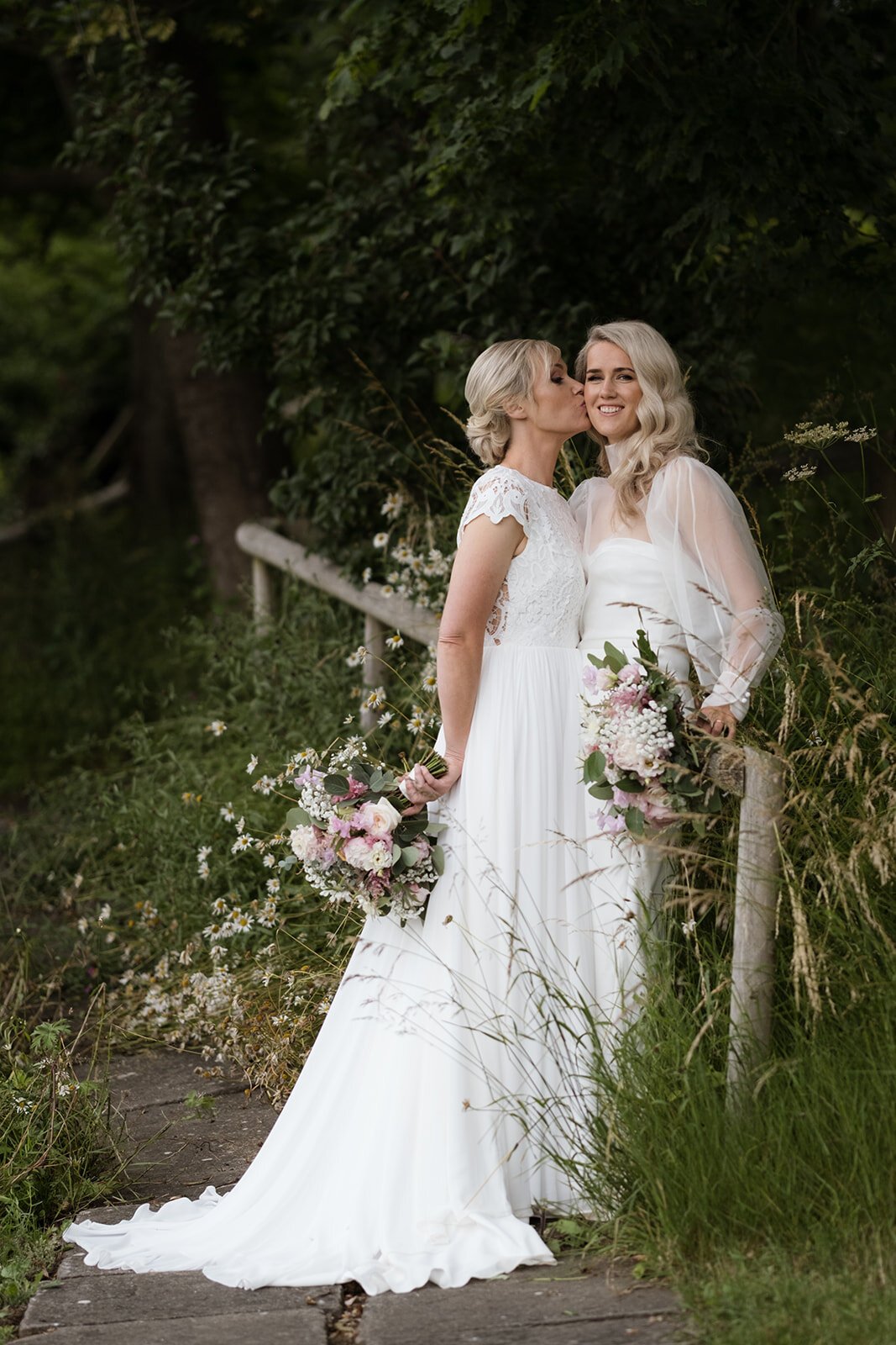 Beautiful bride Emma wore a wedding dress and silk organza top by Halfpenny London