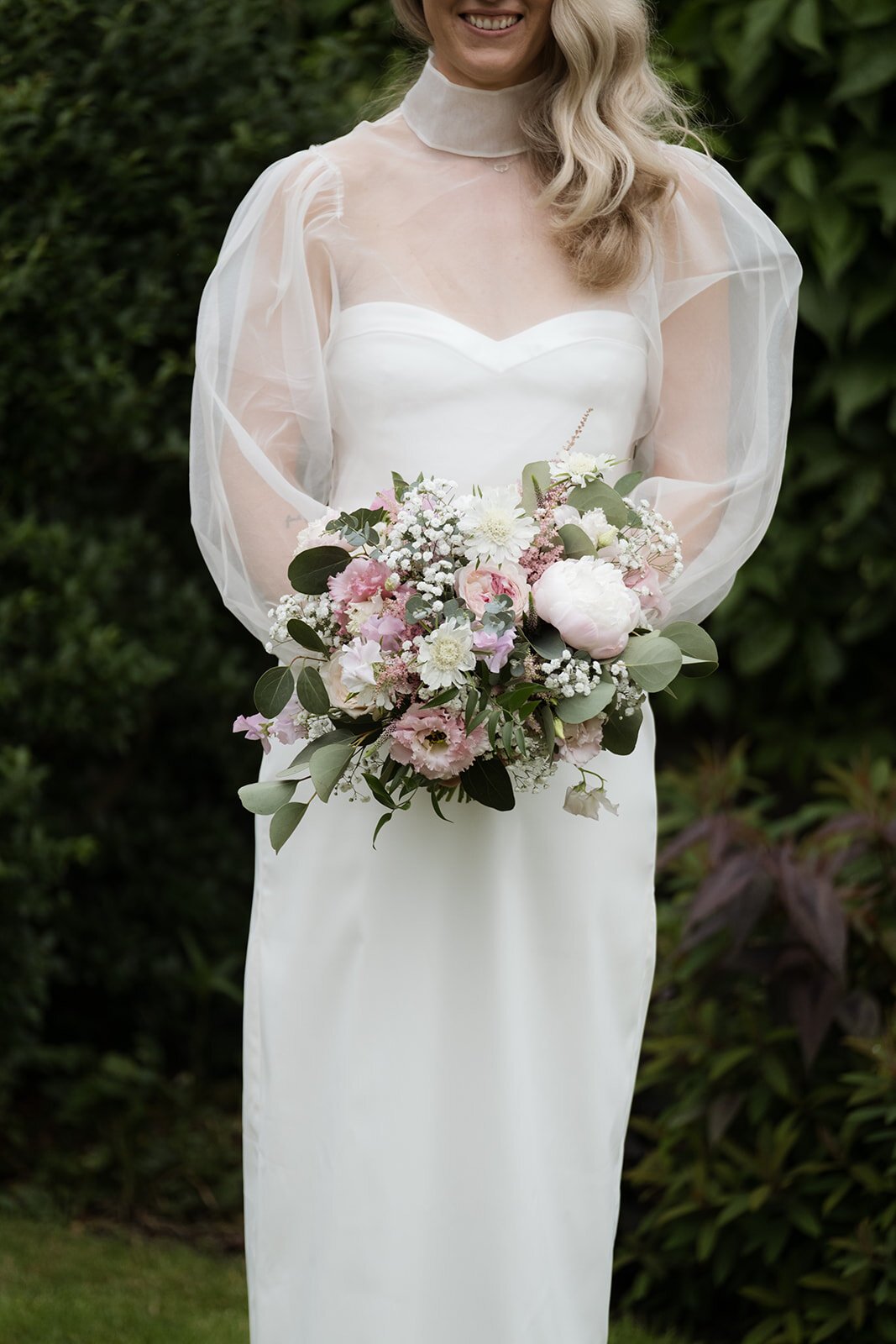 Beautiful bride Emma wore a wedding dress and silk organza top by Halfpenny London
