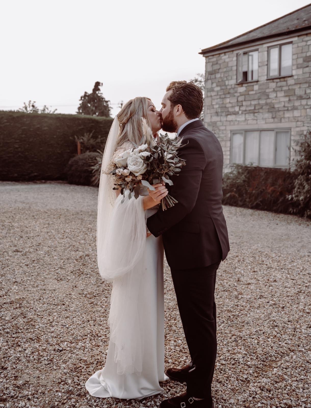 Beautiful bride Sarah wore a wedding dress by Halfpenny London