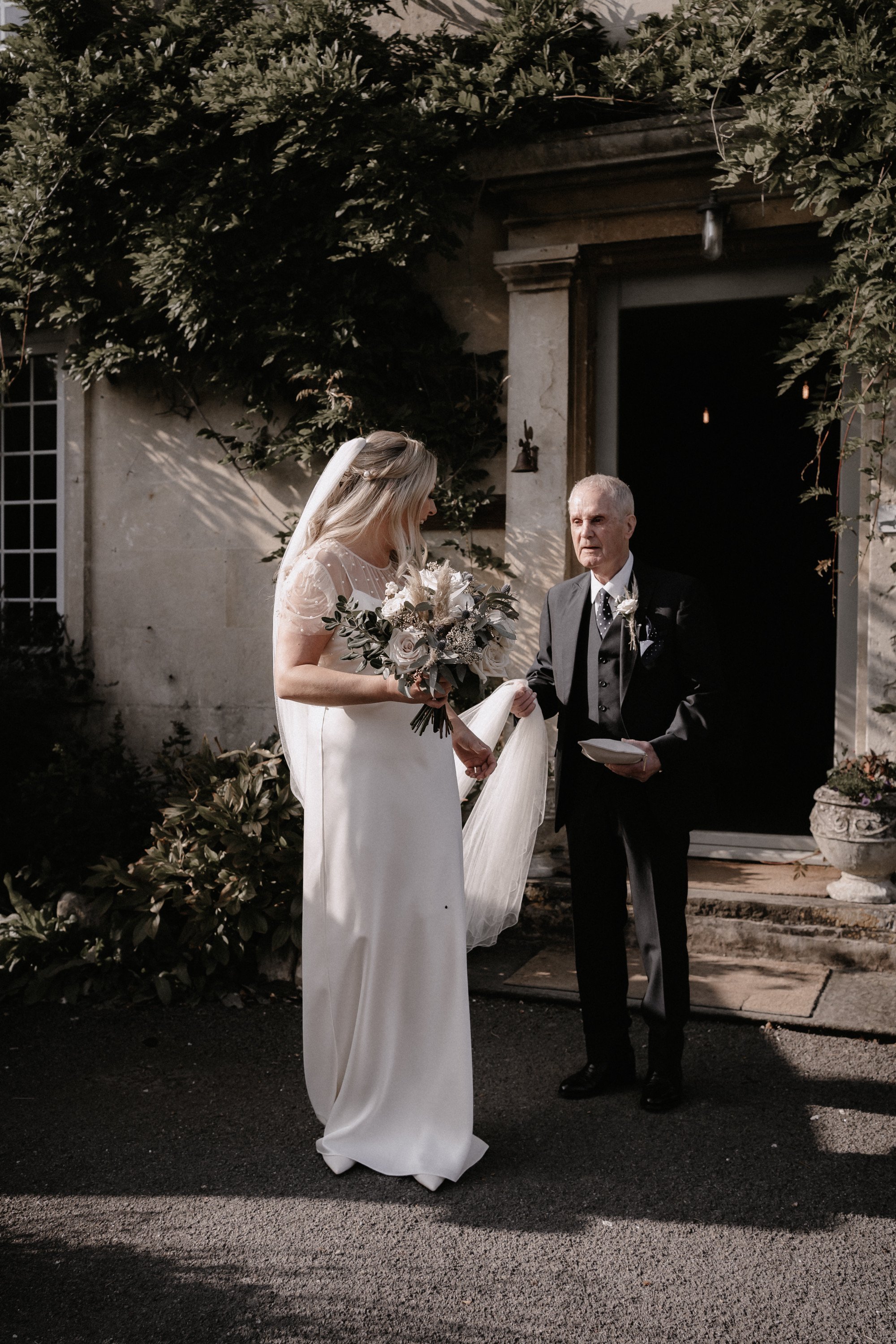 Beautiful bride Sarah wore a wedding dress by Halfpenny London