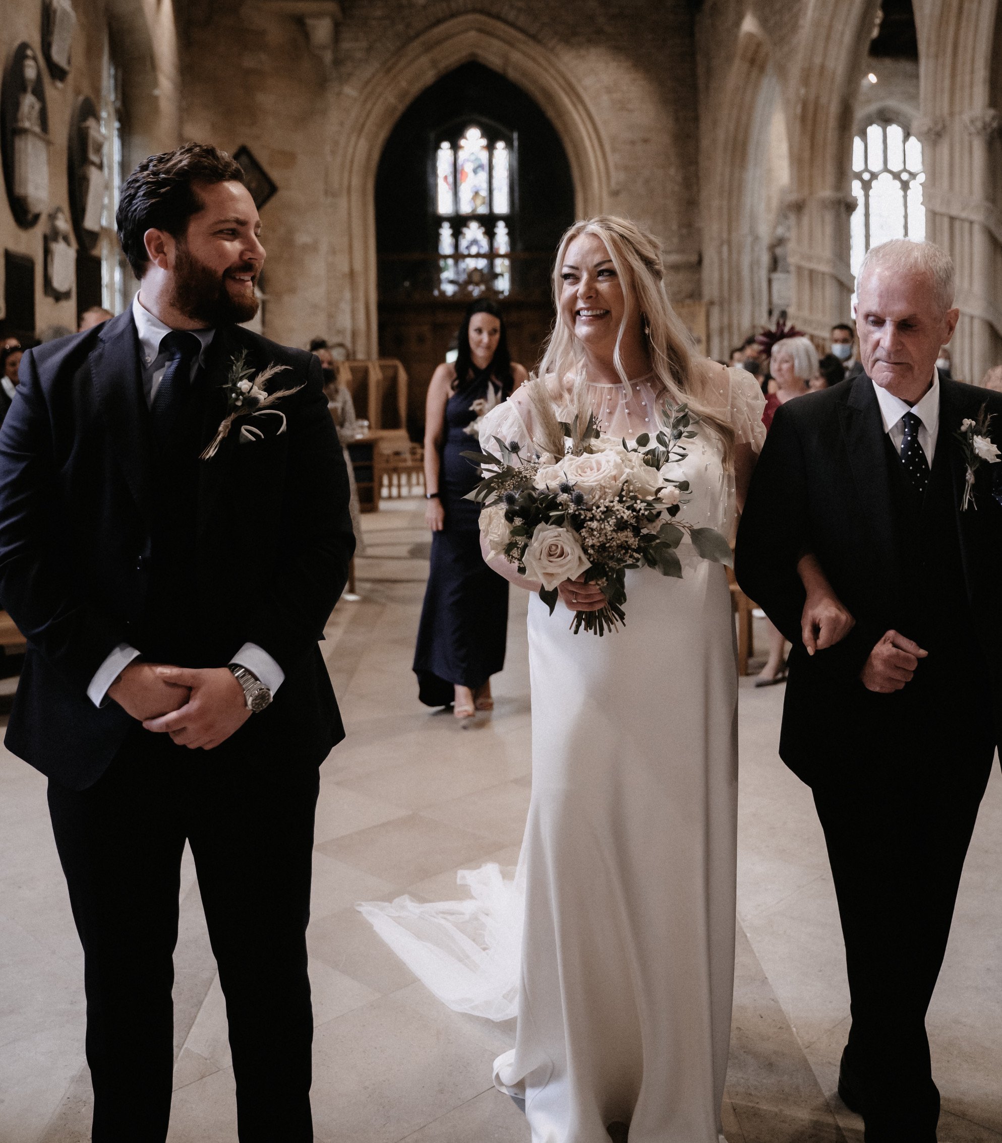 Beautiful bride Sarah wore a wedding dress by Halfpenny London