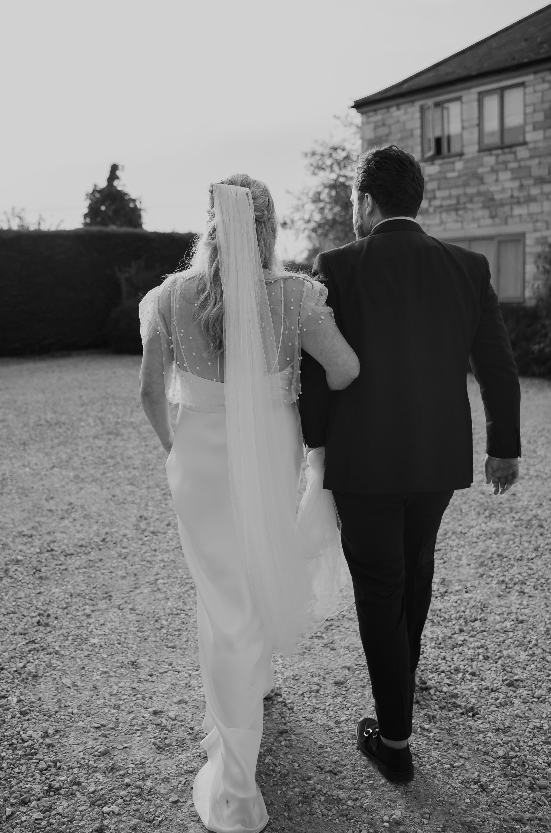 Beautiful bride Sarah wore a wedding dress by Halfpenny London