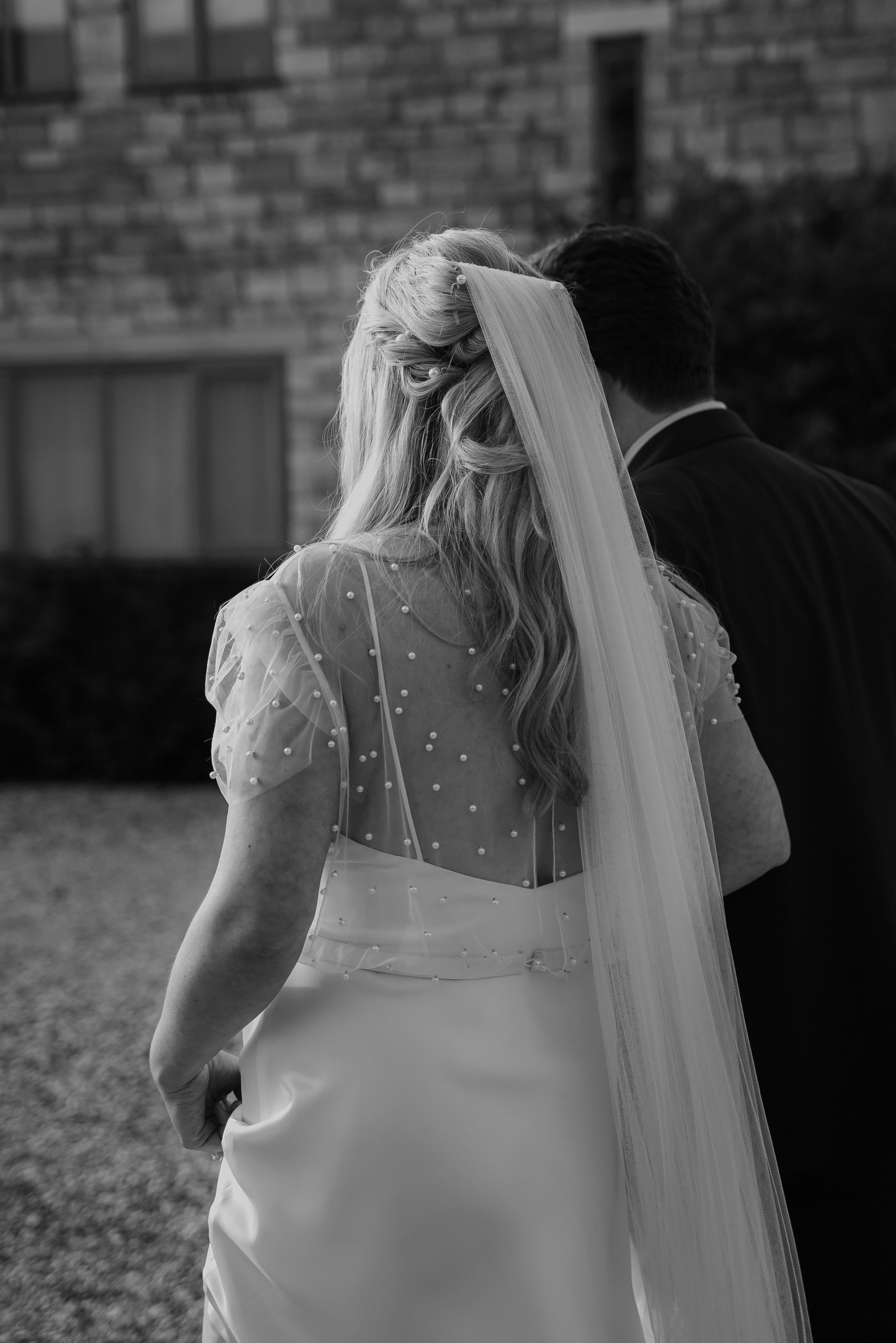 Beautiful bride Sarah wore a wedding dress by Halfpenny London