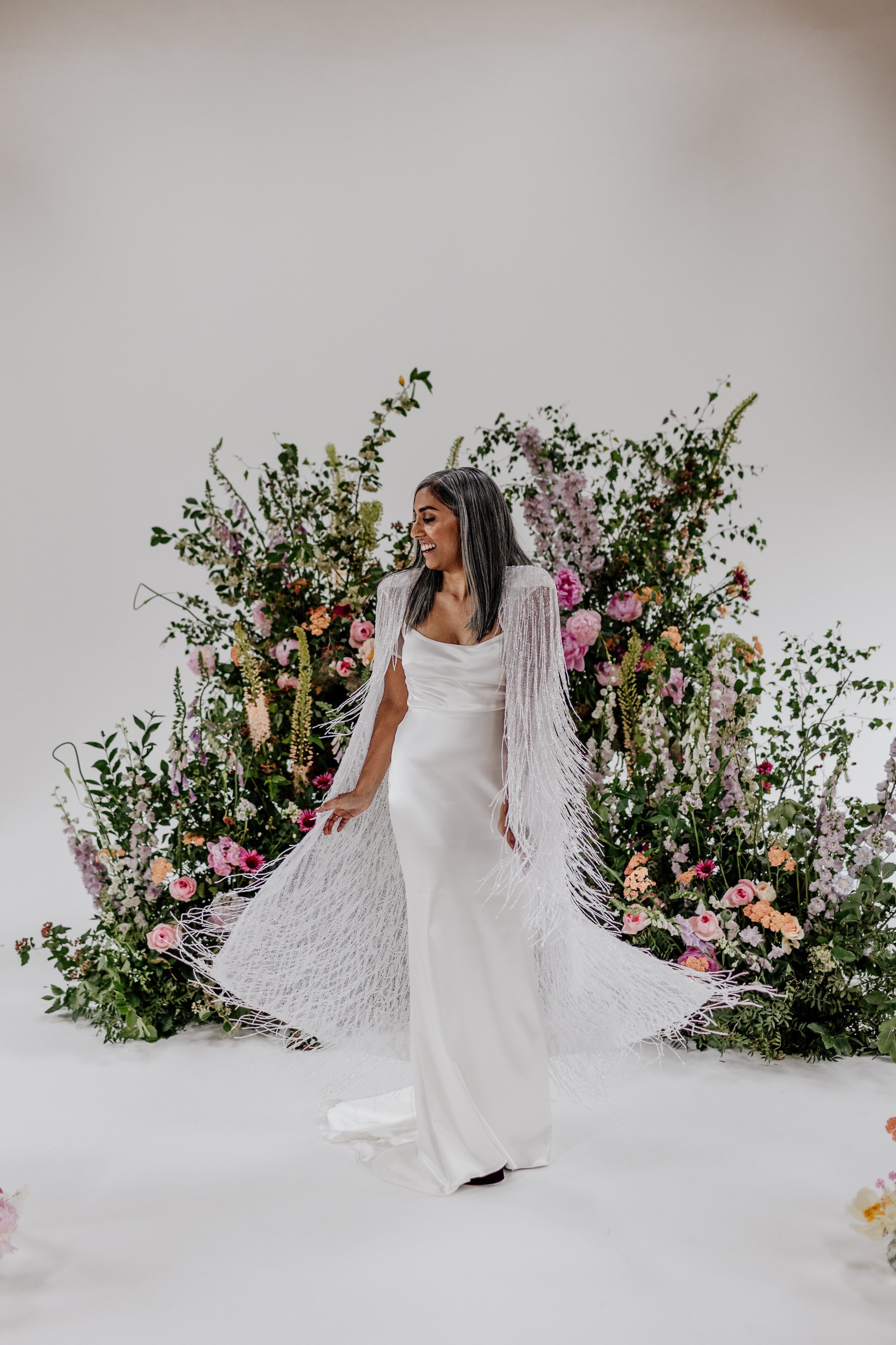 Beautiful bride Rebecca wore a wedding dress and beaded cape by Halfpenny London
