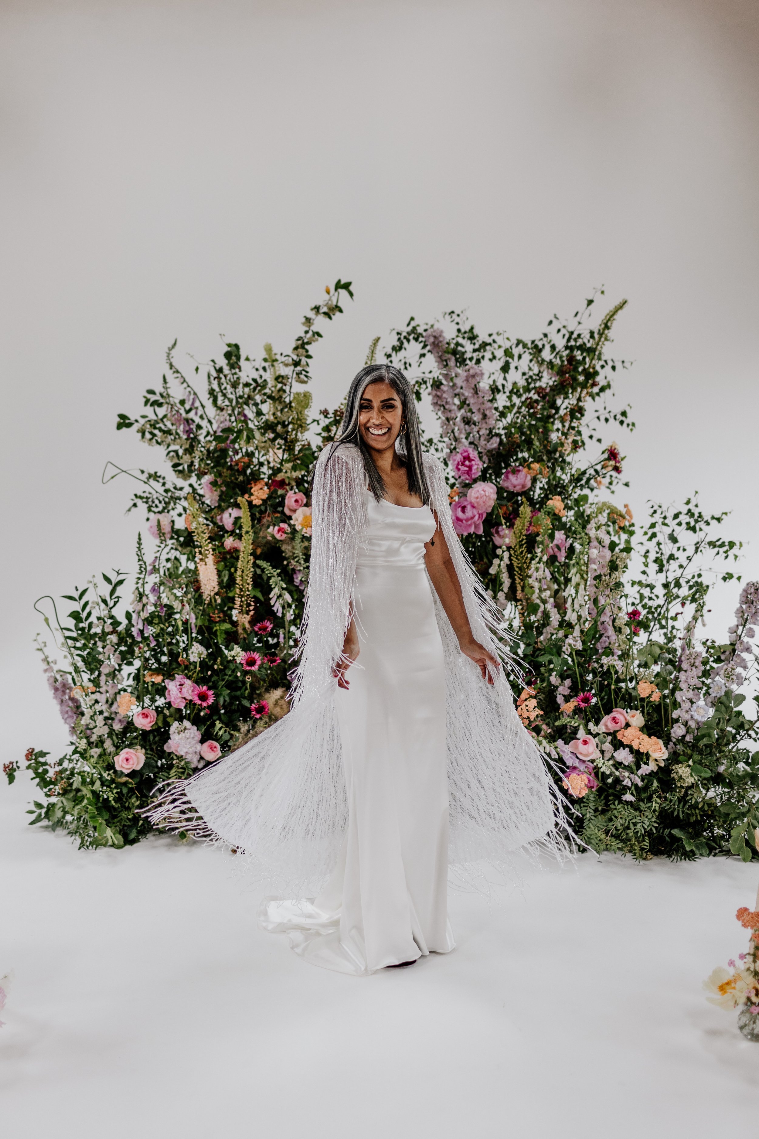 Beautiful bride Rebecca wore a wedding dress and beaded cape by Halfpenny London