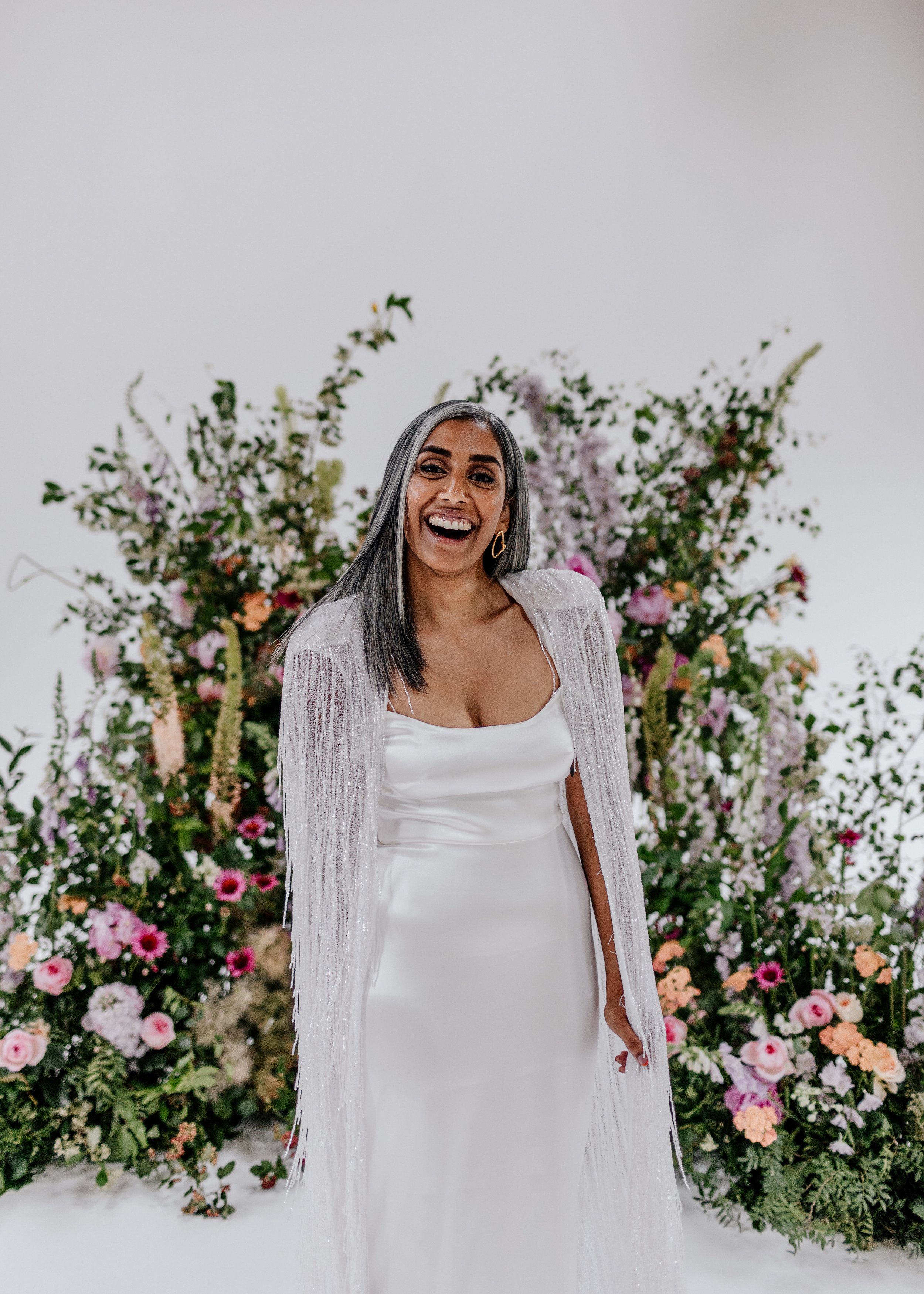 Beautiful bride Rebecca wore a wedding dress and beaded cape by Halfpenny London