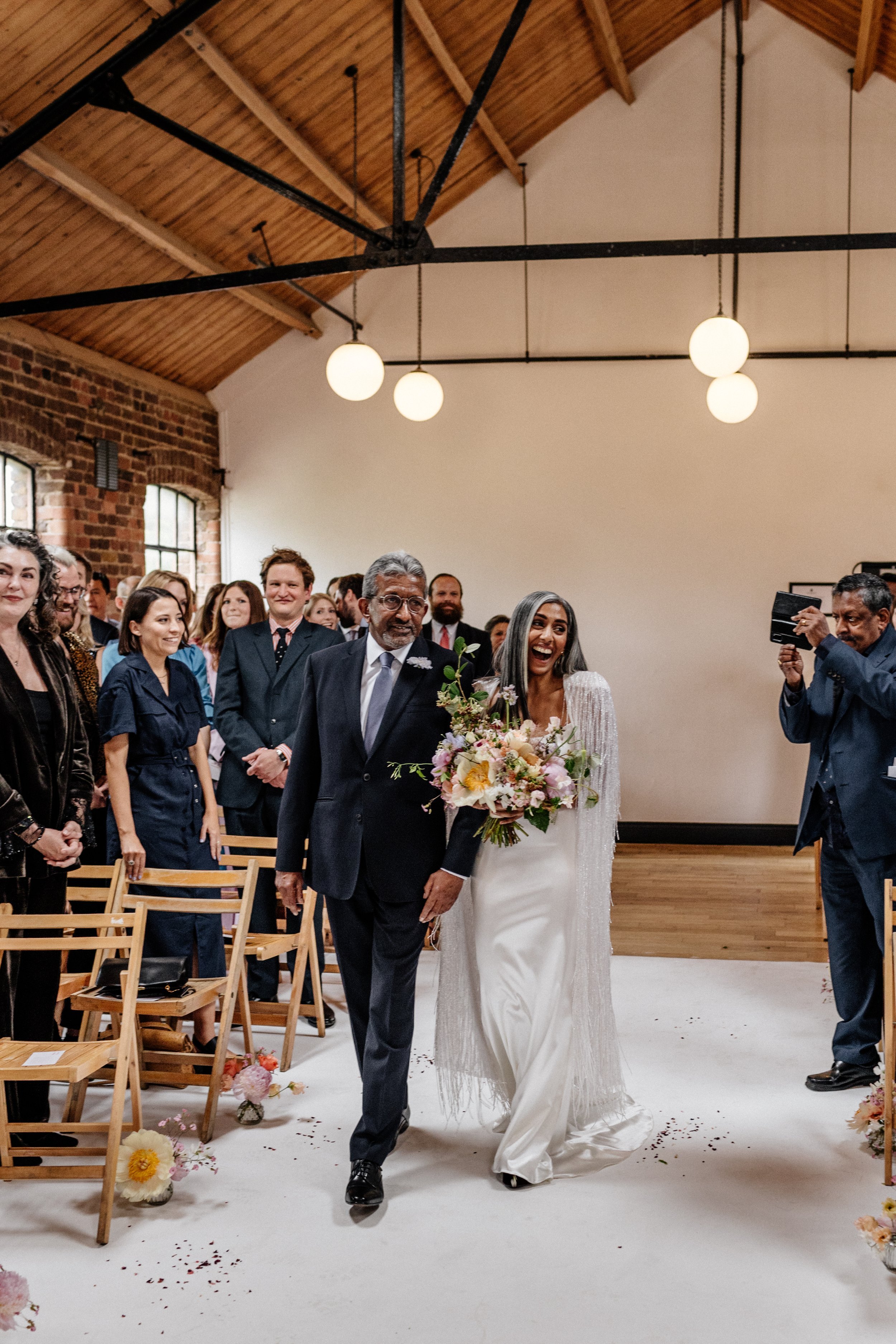 Beautiful bride Rebecca wore a wedding dress and beaded cape by Halfpenny London