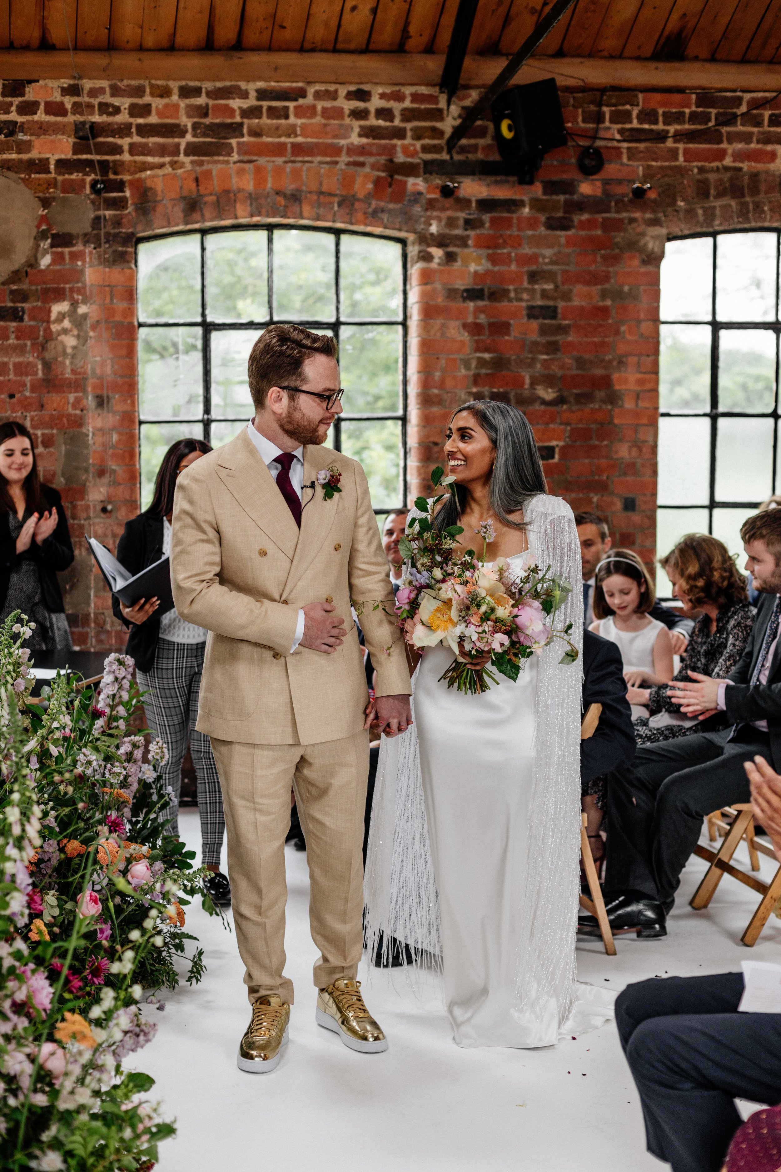 Beautiful bride Rebecca wore a wedding dress and beaded cape by Halfpenny London