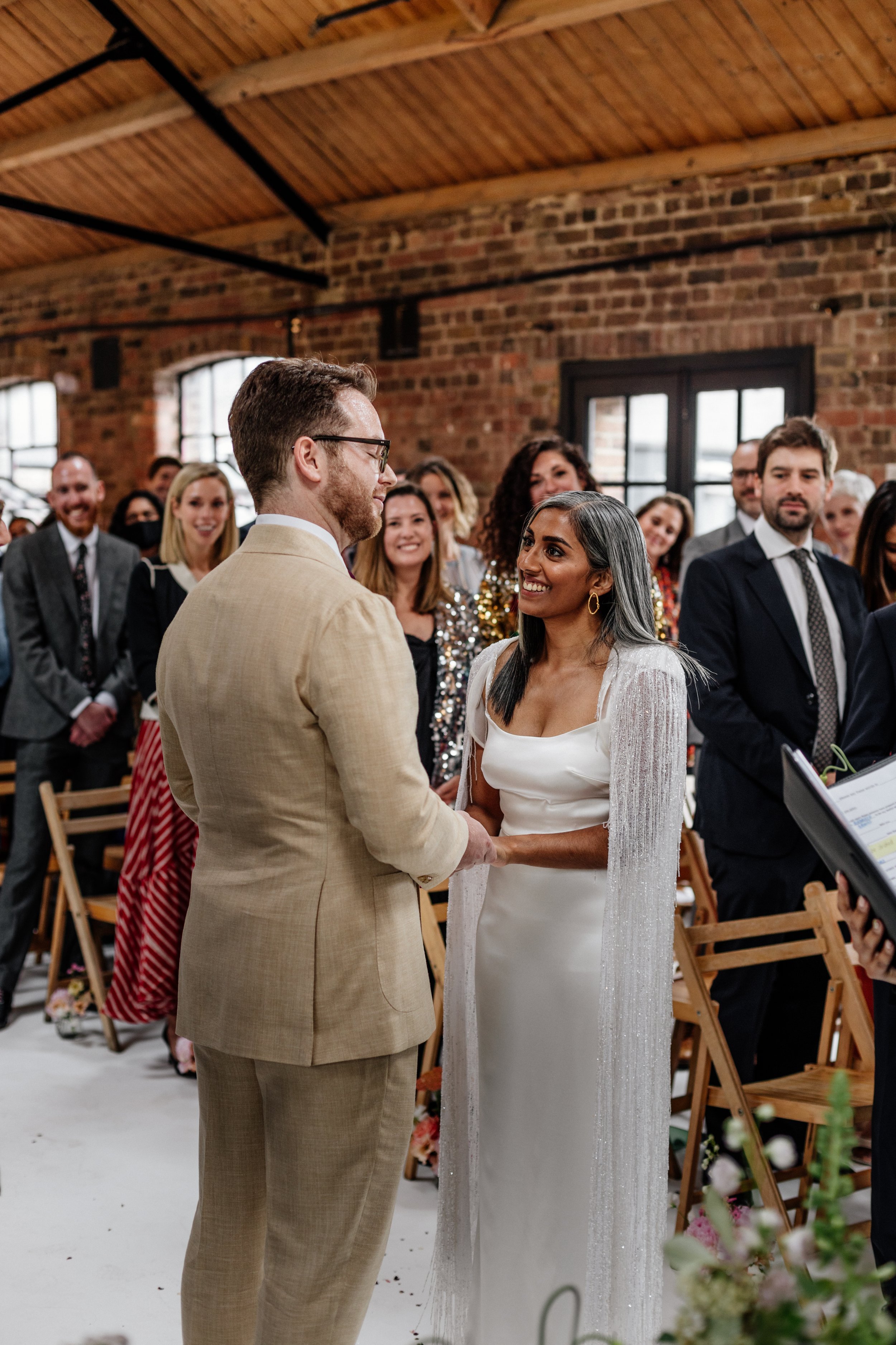 Beautiful bride Rebecca wore a wedding dress and beaded cape by Halfpenny London