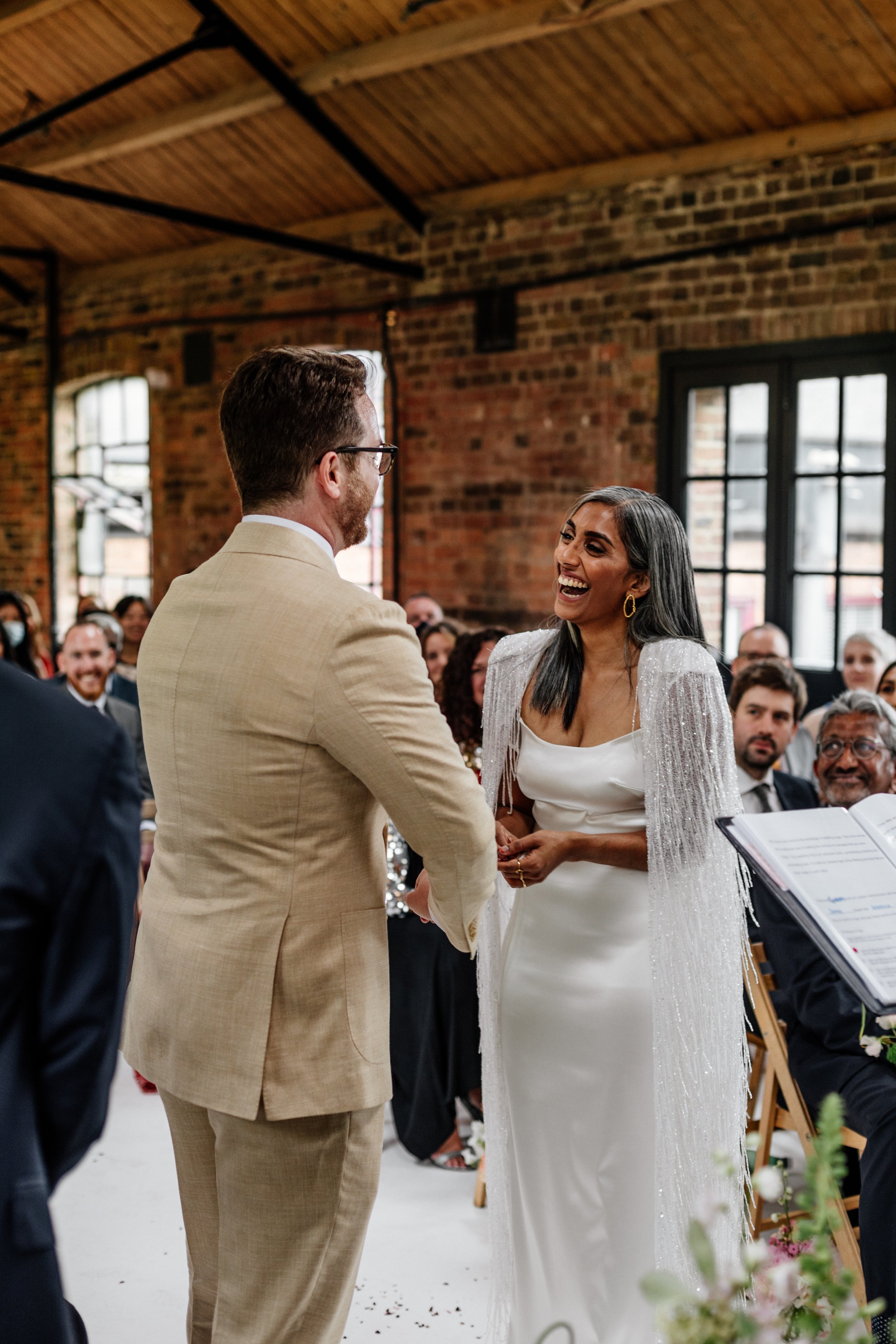 Beautiful bride Rebecca wore a wedding dress and beaded cape by Halfpenny London