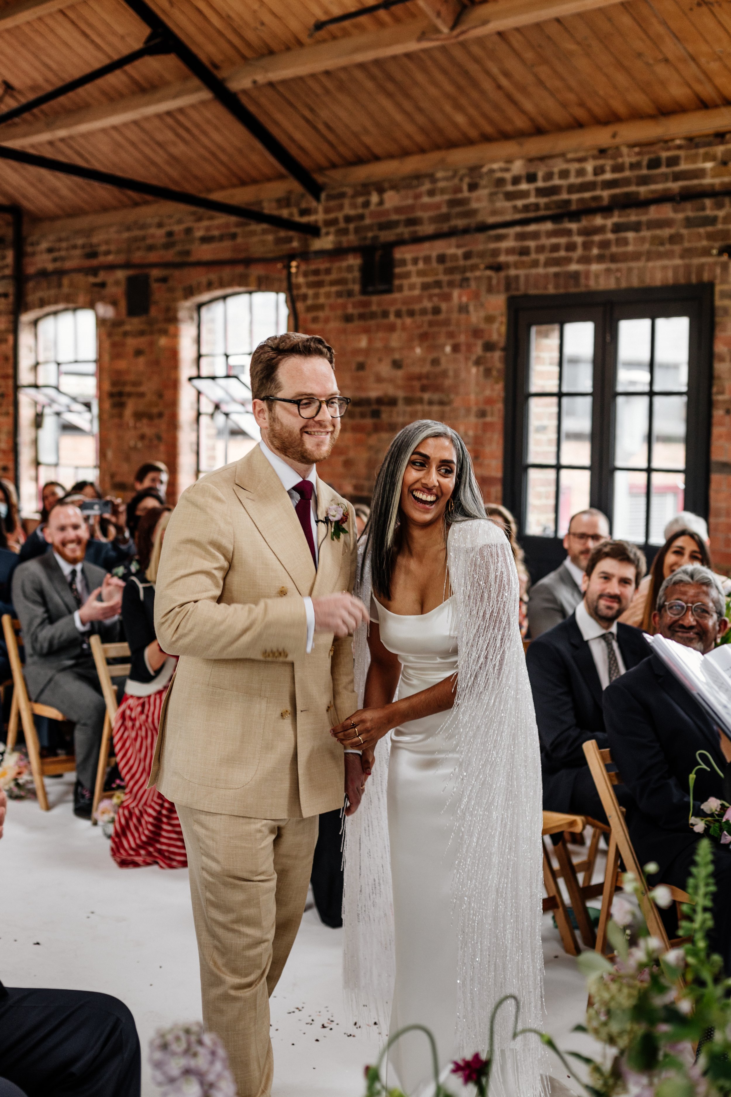 Beautiful bride Rebecca wore a wedding dress and beaded cape by Halfpenny London