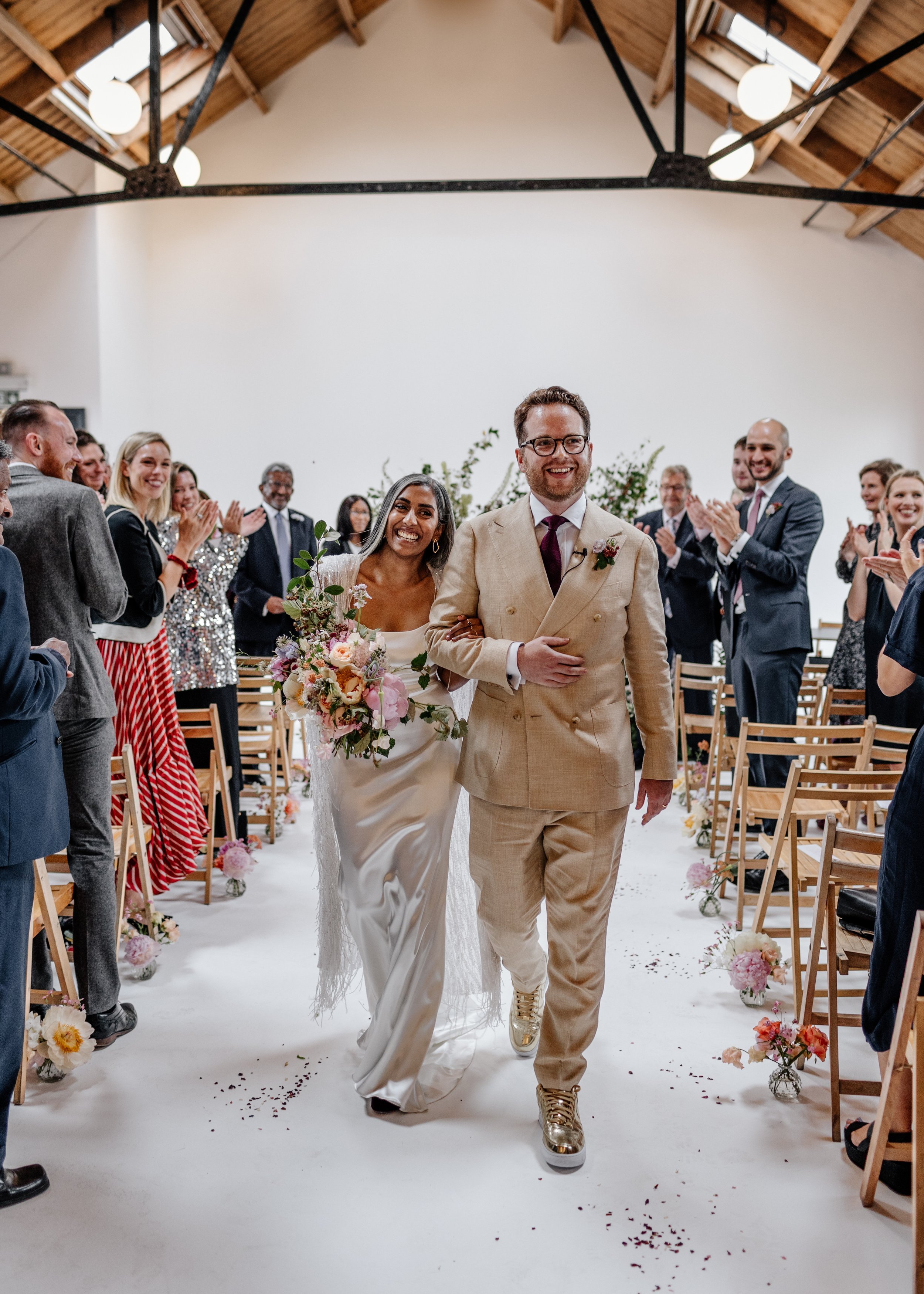 Beautiful bride Rebecca wore a wedding dress and beaded cape by Halfpenny London