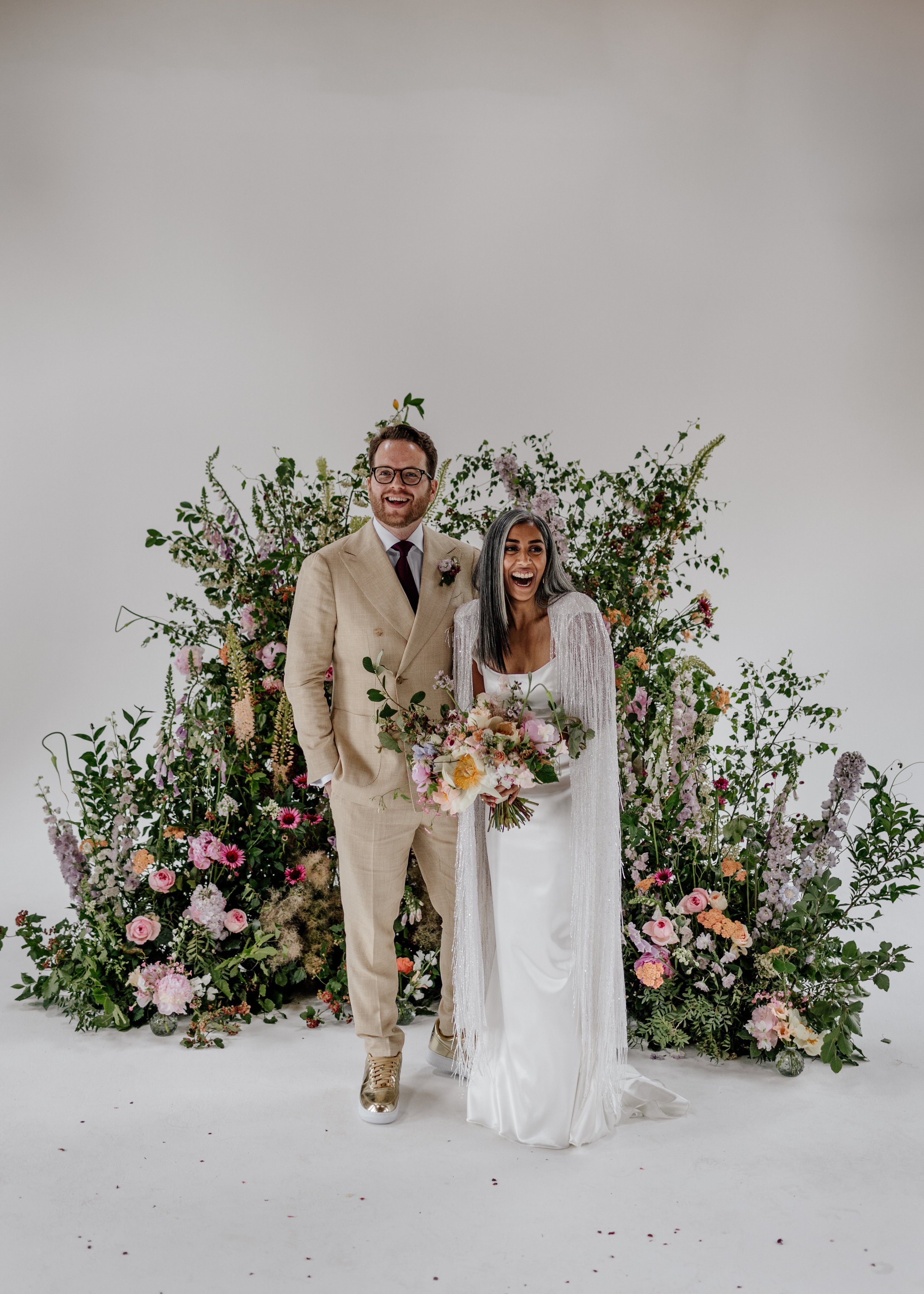 Beautiful bride Rebecca wore a wedding dress and beaded cape by Halfpenny London