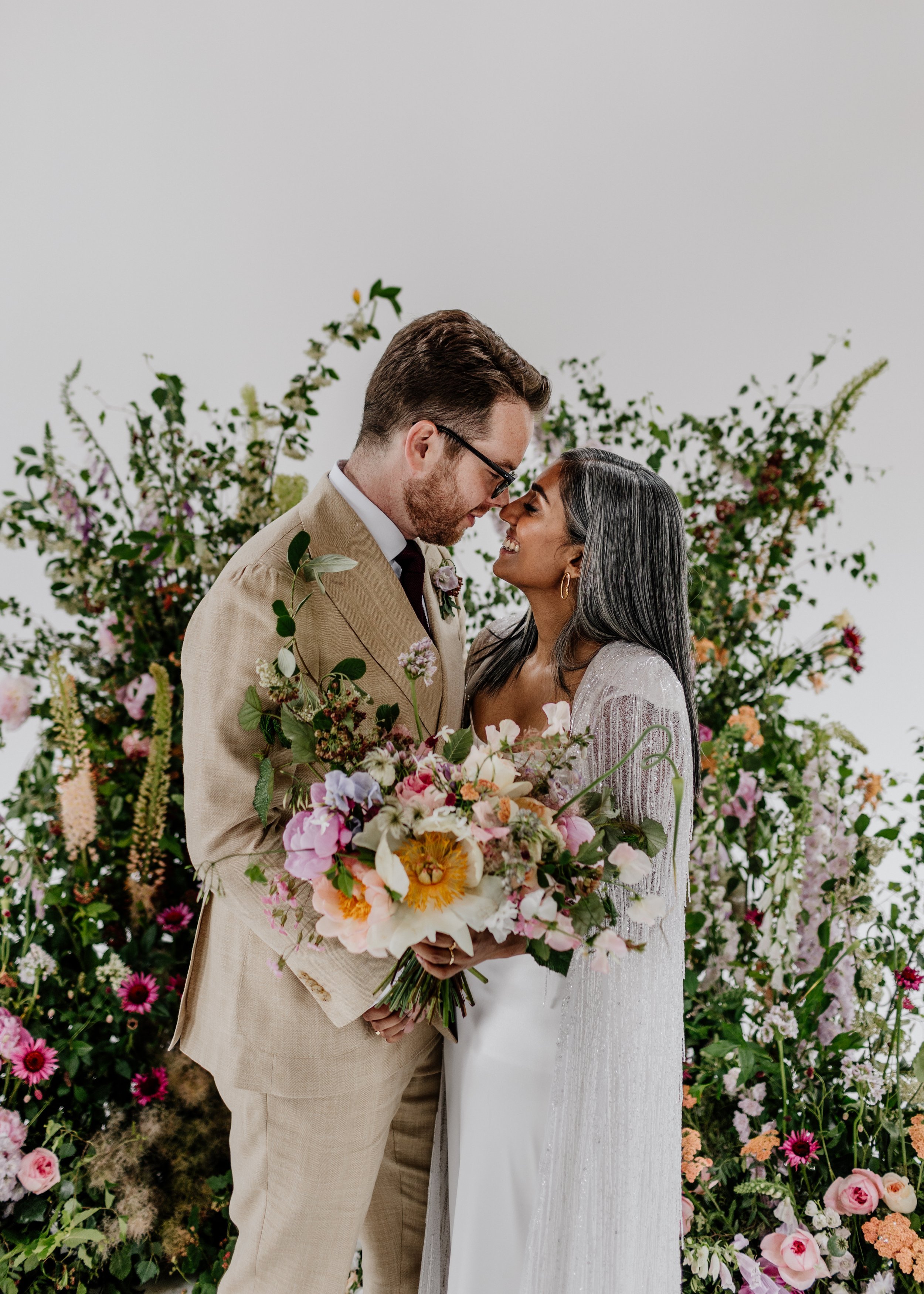 Beautiful bride Rebecca wore a wedding dress and beaded cape by Halfpenny London